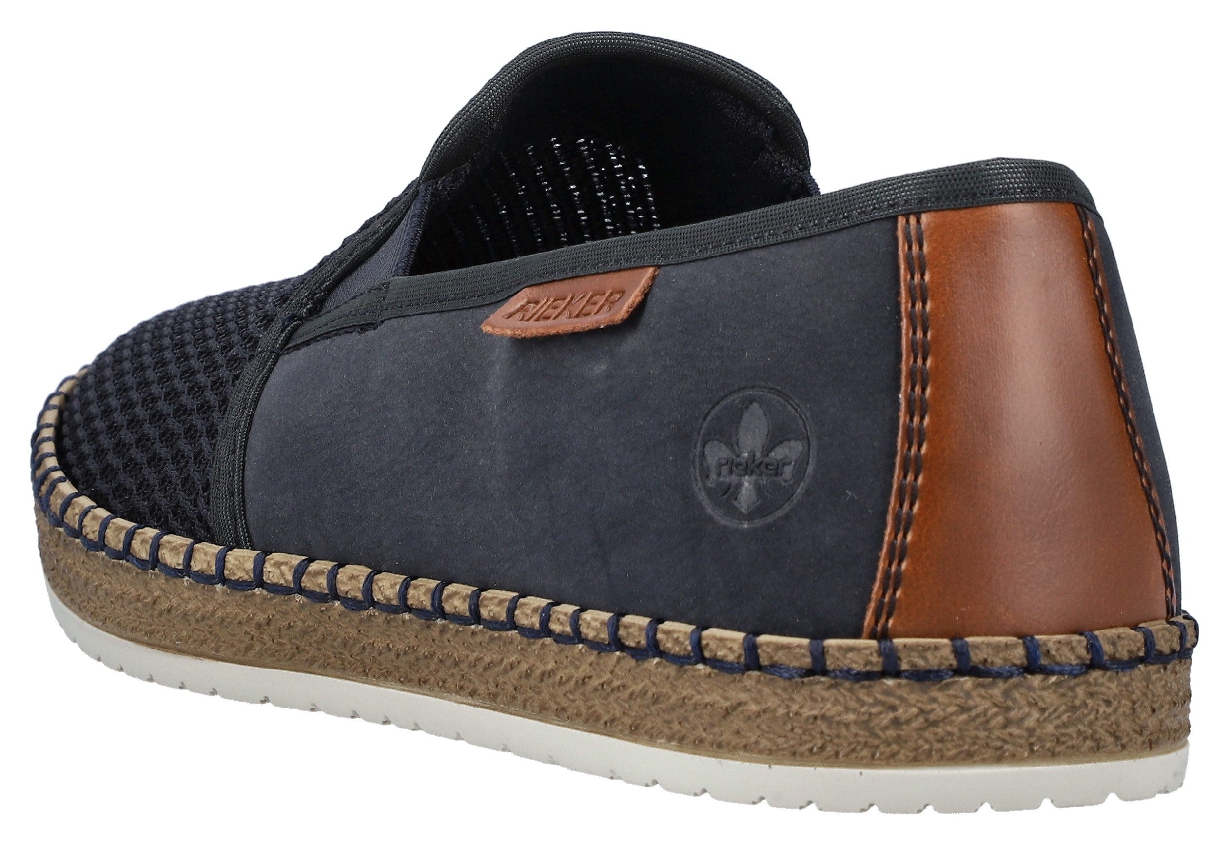 Rieker Slipper mit modischer Laufsohle in Bast-Optik