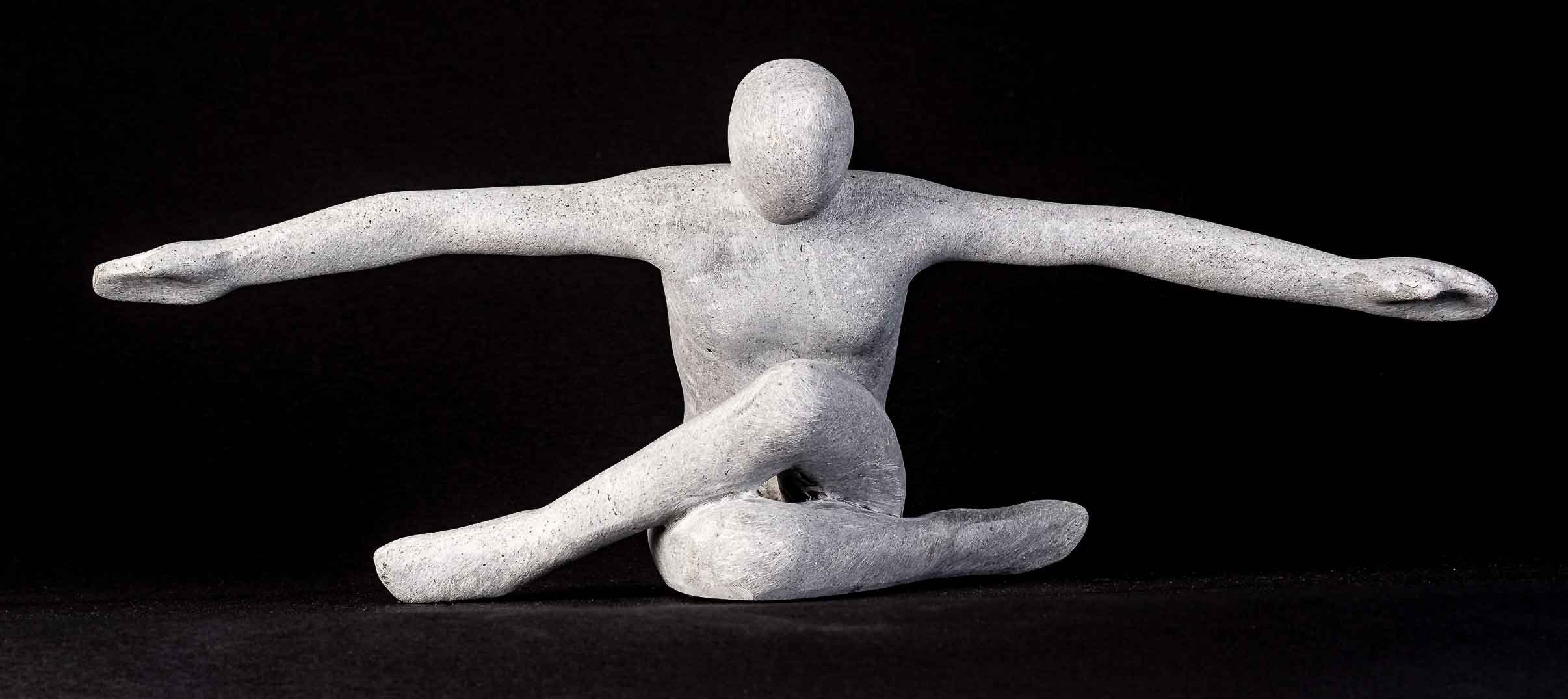 IDYL Dekofigur IDYL Sandstein-Skulptur Flying Man, Diese Figuren fallen auf durch ihre Schlichtheit und Eleganz