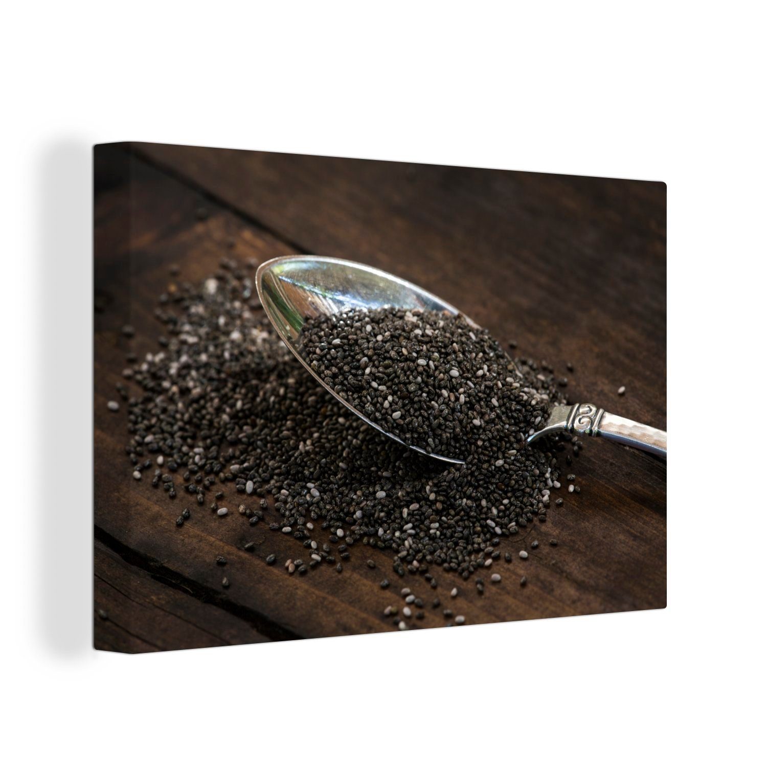 OneMillionCanvasses® Leinwandbild Dunkelbraunes Holz mit einem Metalllöffel mit Chiasamen, (1 St), Wandbild Leinwandbilder, Aufhängefertig, Wanddeko, 30x20 cm