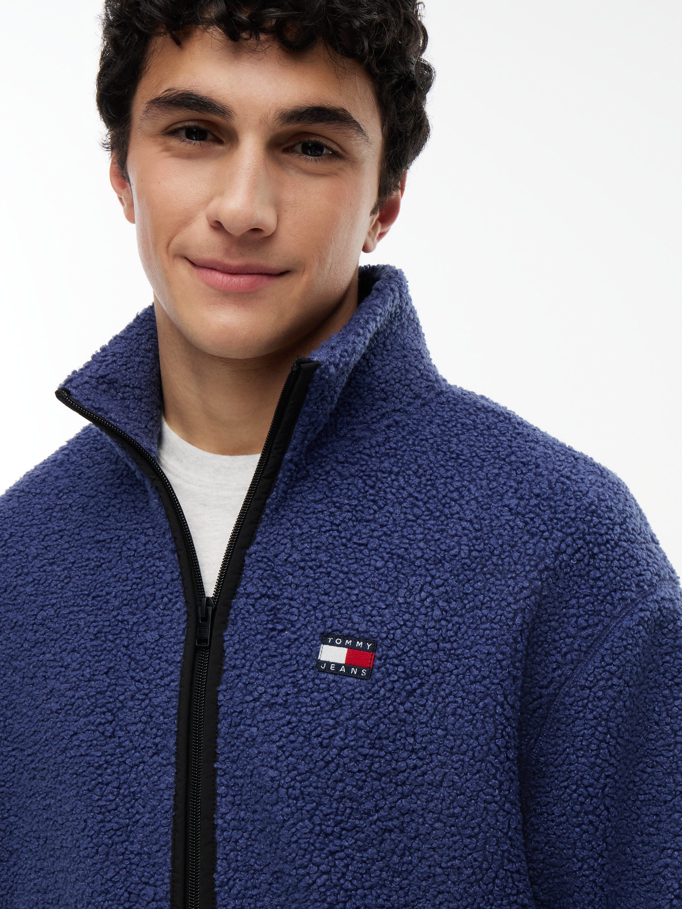 Tommy Jeans Fleecejacke TJM BADGE TEDDY Stehkragen, Teddyfleece, relaxed fit