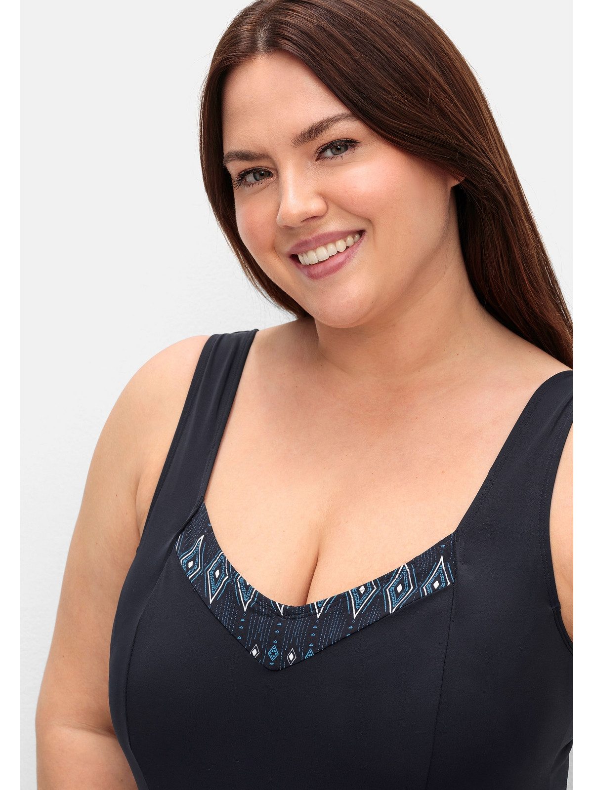 Sheego Badekleid Große Größen mit fixiertem Slip und wattierten Softcups