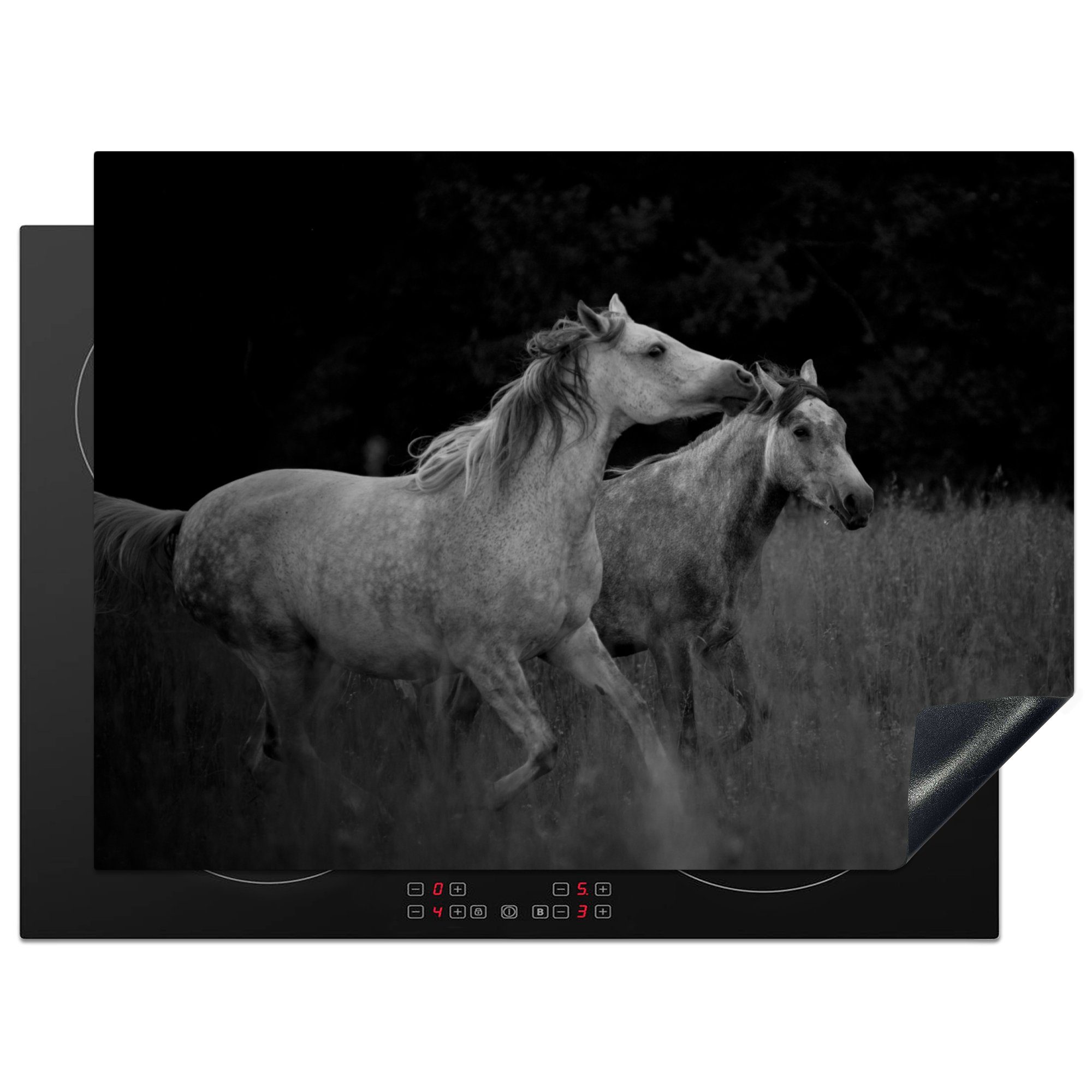 MuchoWow Herdblende-/Abdeckplatte Zwei galoppierende Pferde auf einer Wiese in Schwarz und Weiß, Vinyl, (1 tlg), 70x52 cm, Mobile Arbeitsfläche nutzbar, Ceranfeldabdeckung