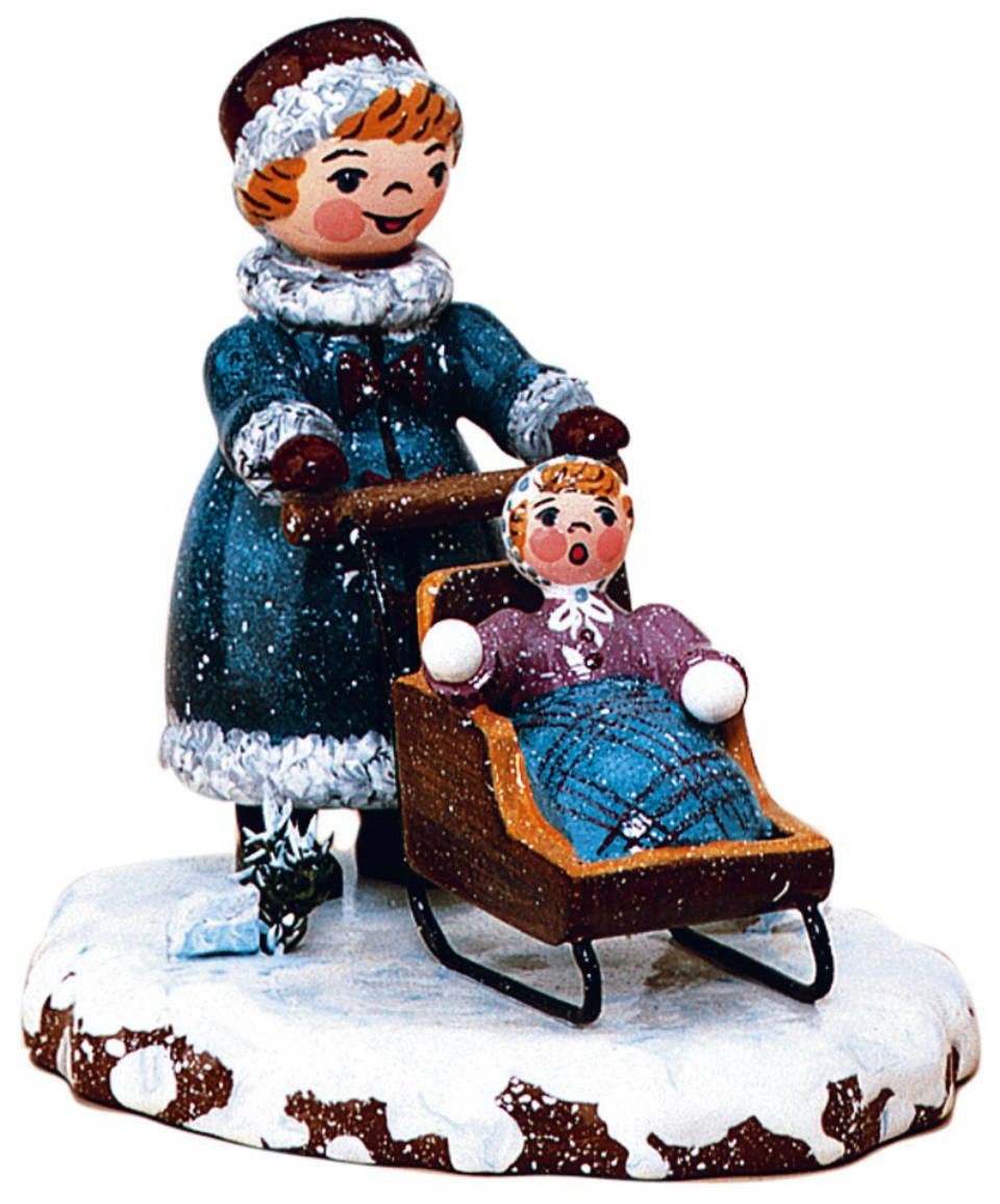 Hubrig Volkskunst Zschorlau Erzgebirge Sammelfigur Hubrig Winterkinder Mädchen mit Kinderschlitten