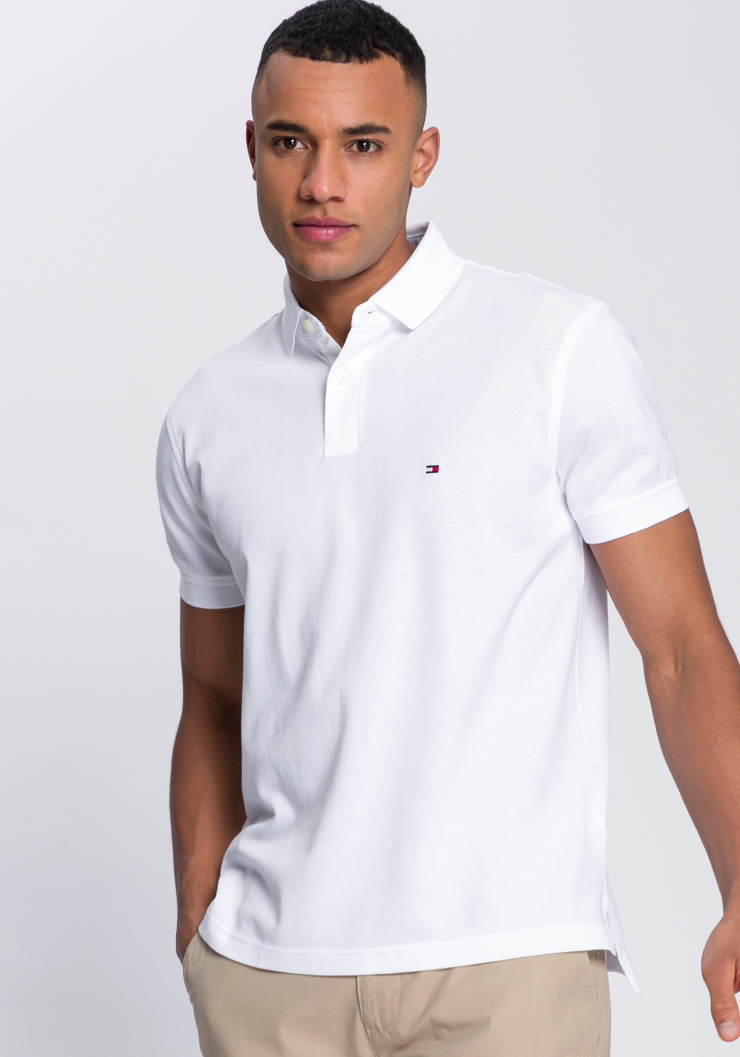 Tommy Hilfiger Poloshirt 1985 REGULAR POLO aus hochwertiger Baumwoll-Piqué-Qualität. Reduzierter Preis € 67,99. Unverbindliche Preisempfehlung € 79,90