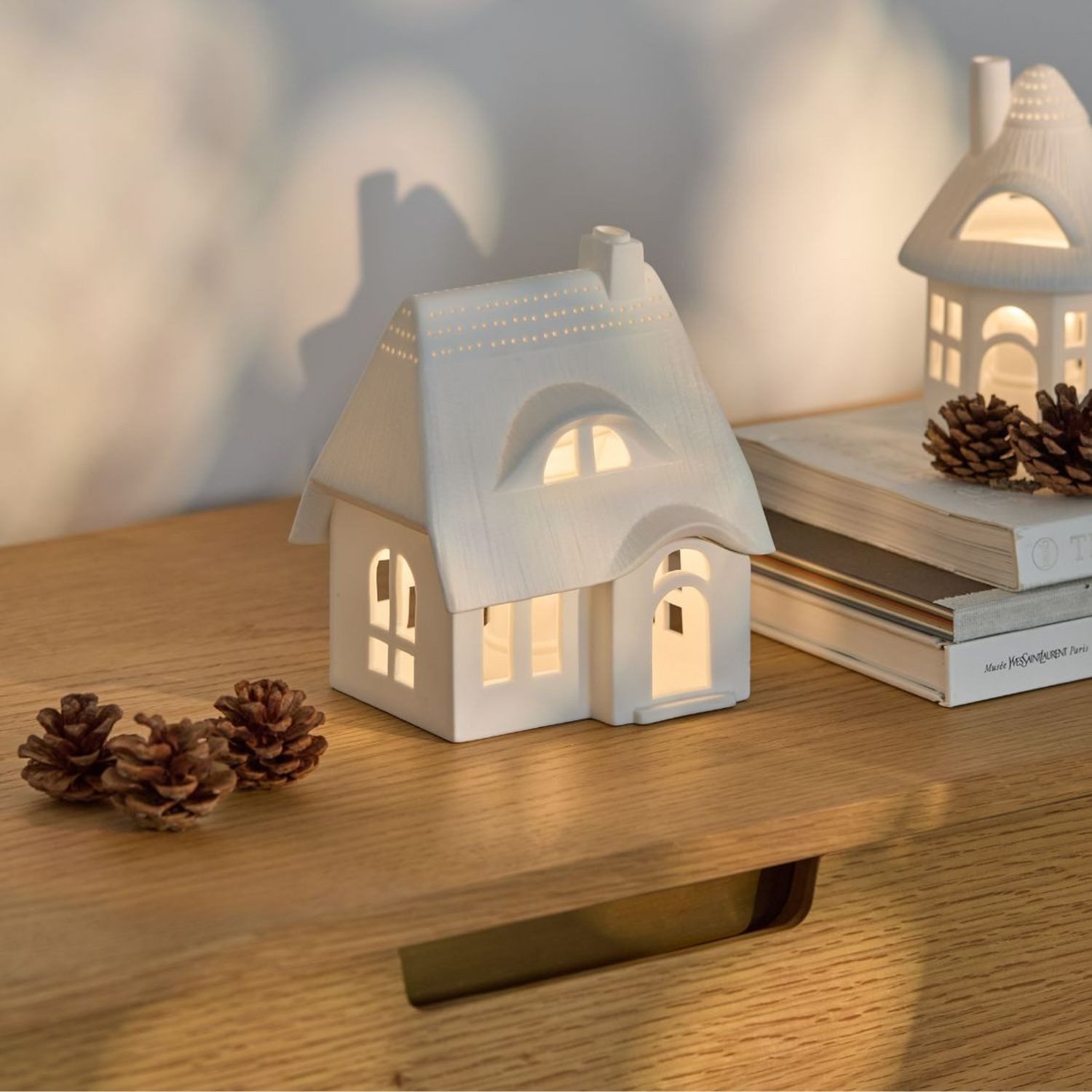 Räder Design Teelichthalter Lichthaus Reetdachhaus