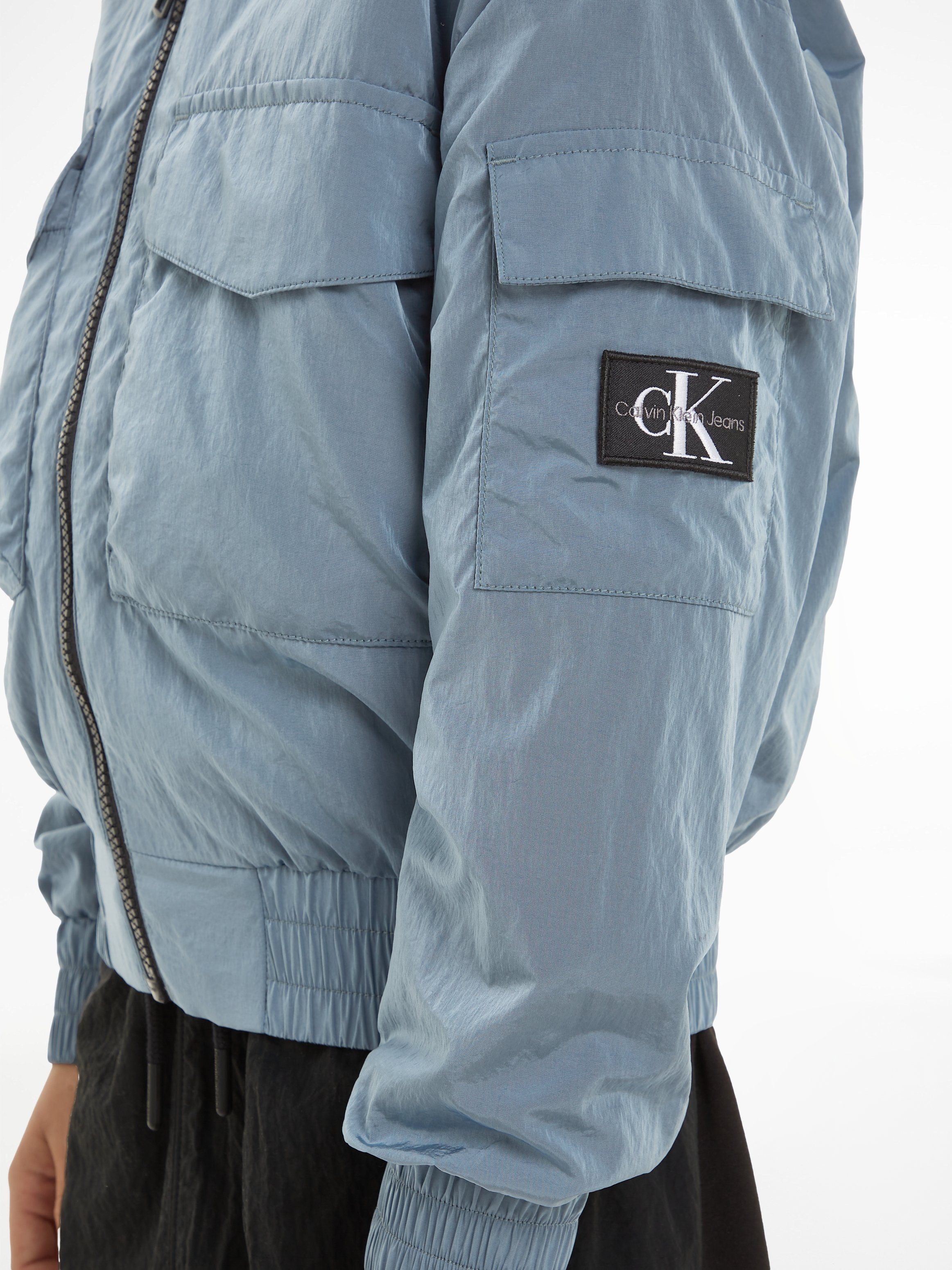 Calvin Klein Bomberjacke Logopatch mit ZIPPED STRUCTURED Jeans NYLON BOMBER