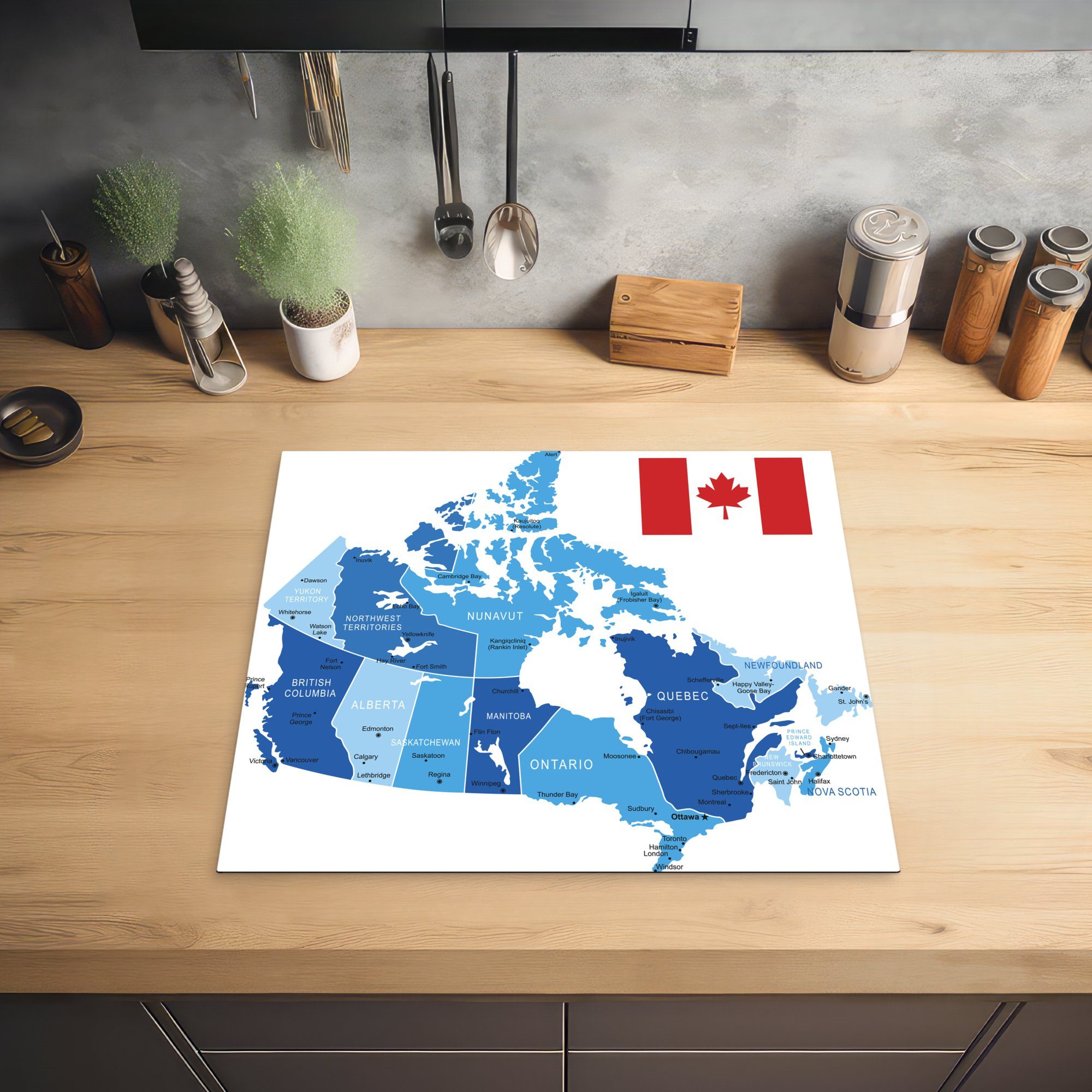 MuchoWow Herdblende-/Abdeckplatte Illustration einer von Arbeitsfläche Ceranfeldabdeckung blauen Karte Kanada, Vinyl, 60x52 (1 nutzbar, cm, Mobile tlg)