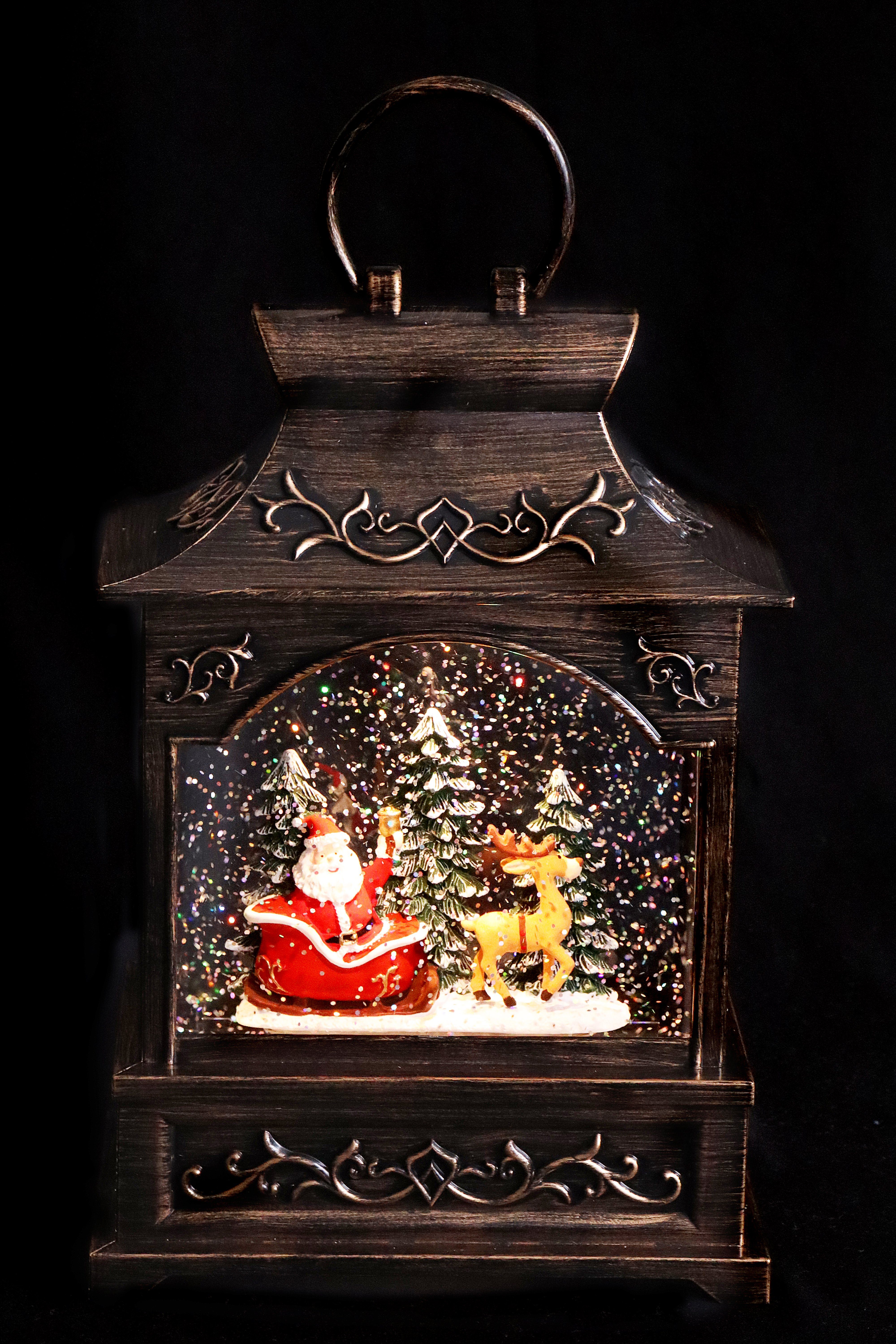 ELLUG Schneekugel Schneekugel mit Weihnachtsmann & Schlitten, Musik, Licht