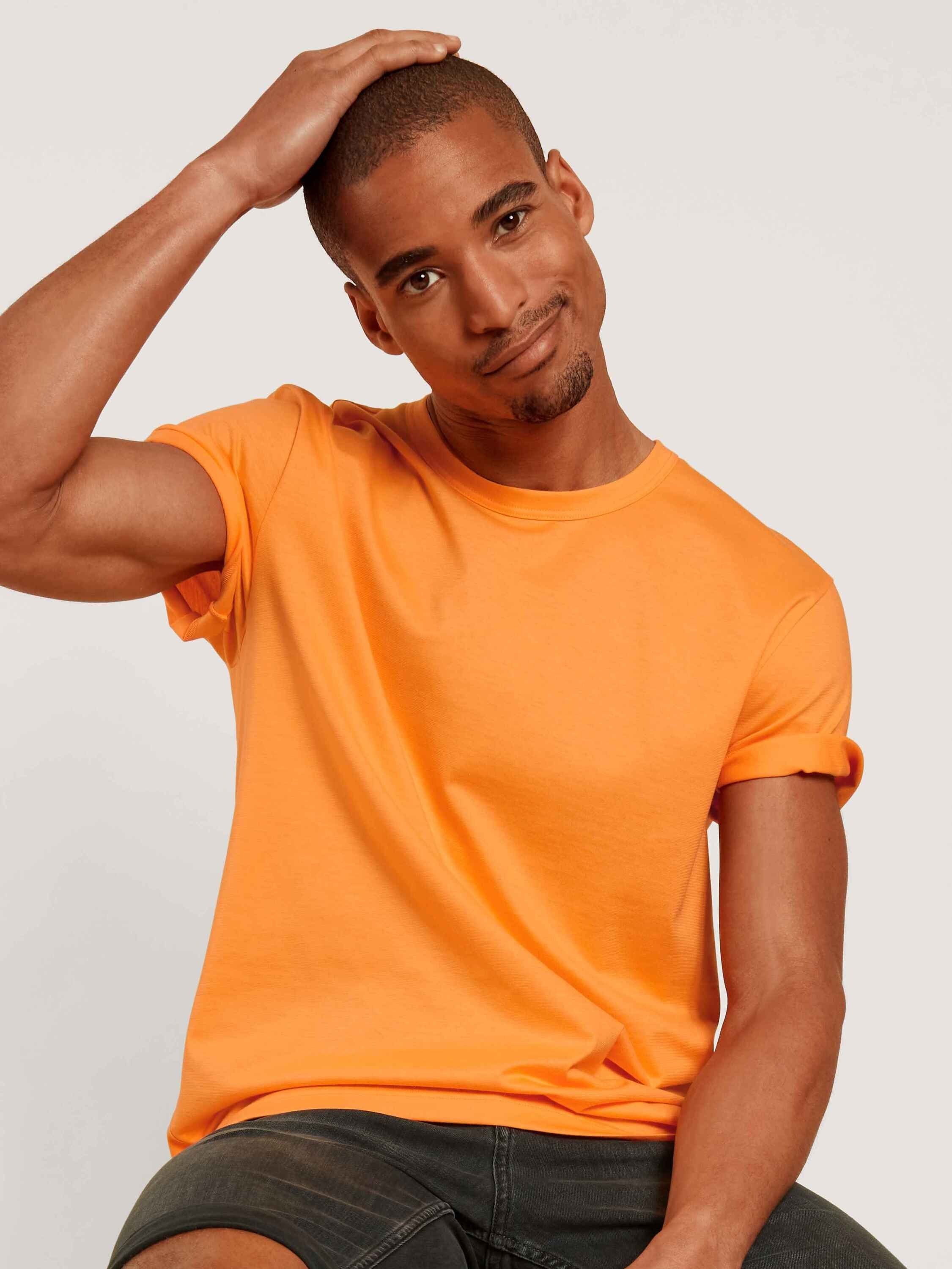 Neue Produkte im Versandhandel supergünstig! CALIDA Kurzarmshirt blazing Rundhals Kurzarm-Shirt, (1-tlg) orange