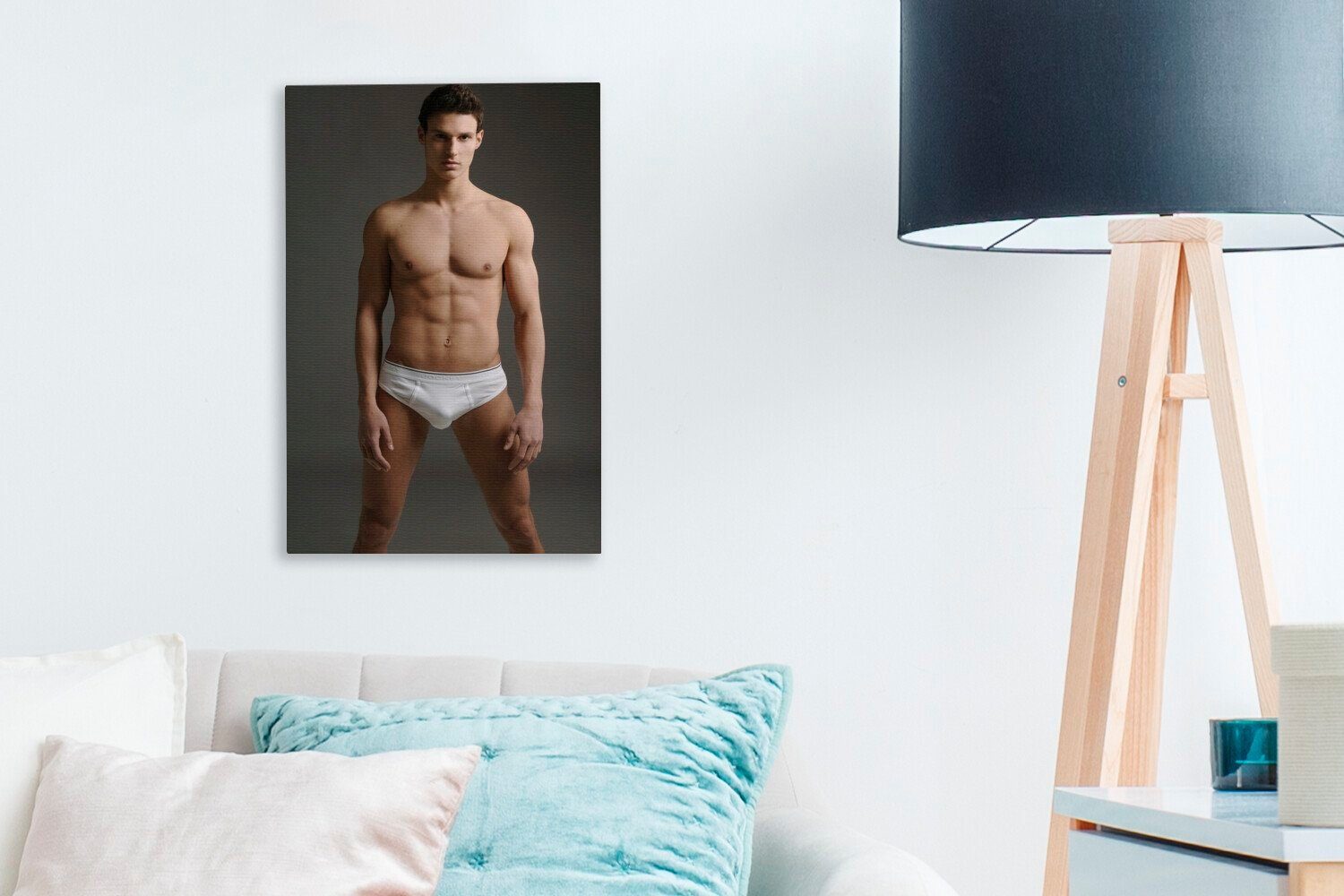 OneMillionCanvasses® Leinwandbild Ein Mann posiert 20x30 inkl. St), Leinwandbild bespannt in cm Zackenaufhänger, Hosen, weißen (1 fertig Gemälde