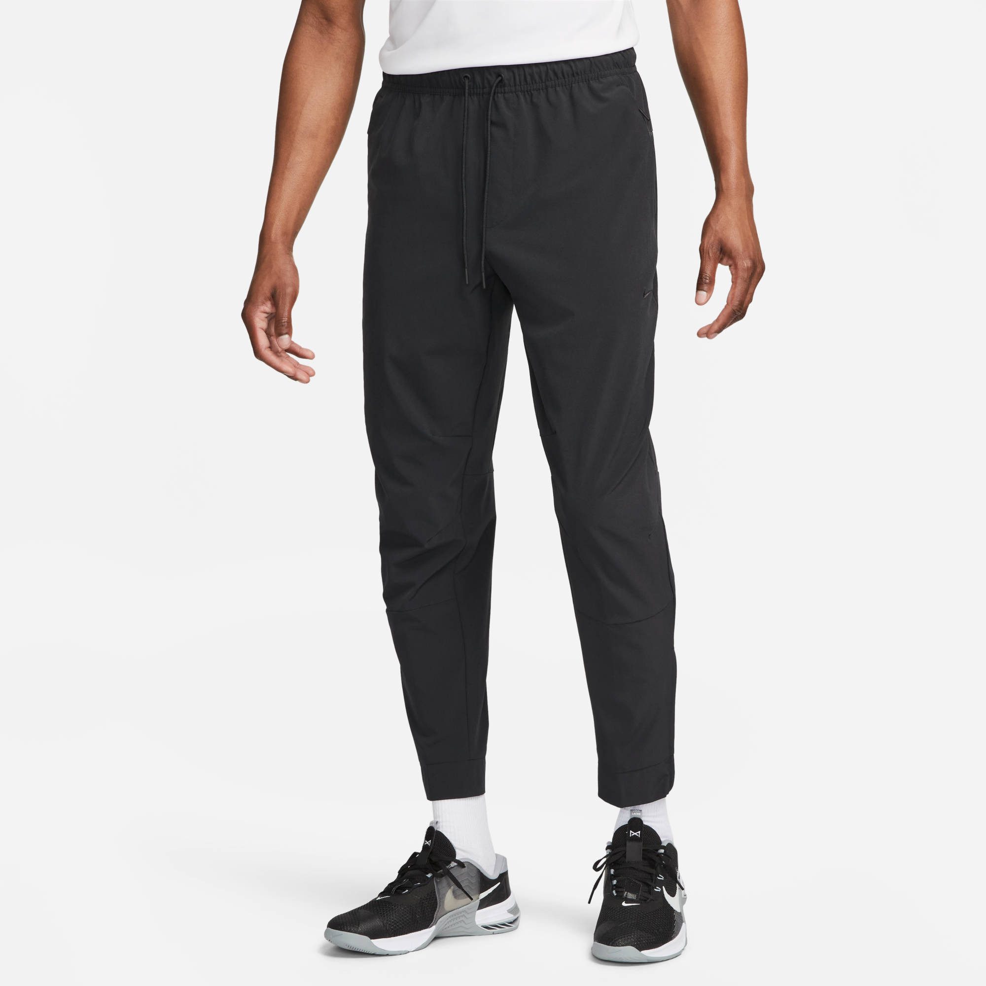 Nike Sporthose M NK DF UNLIMITED PANT TPR