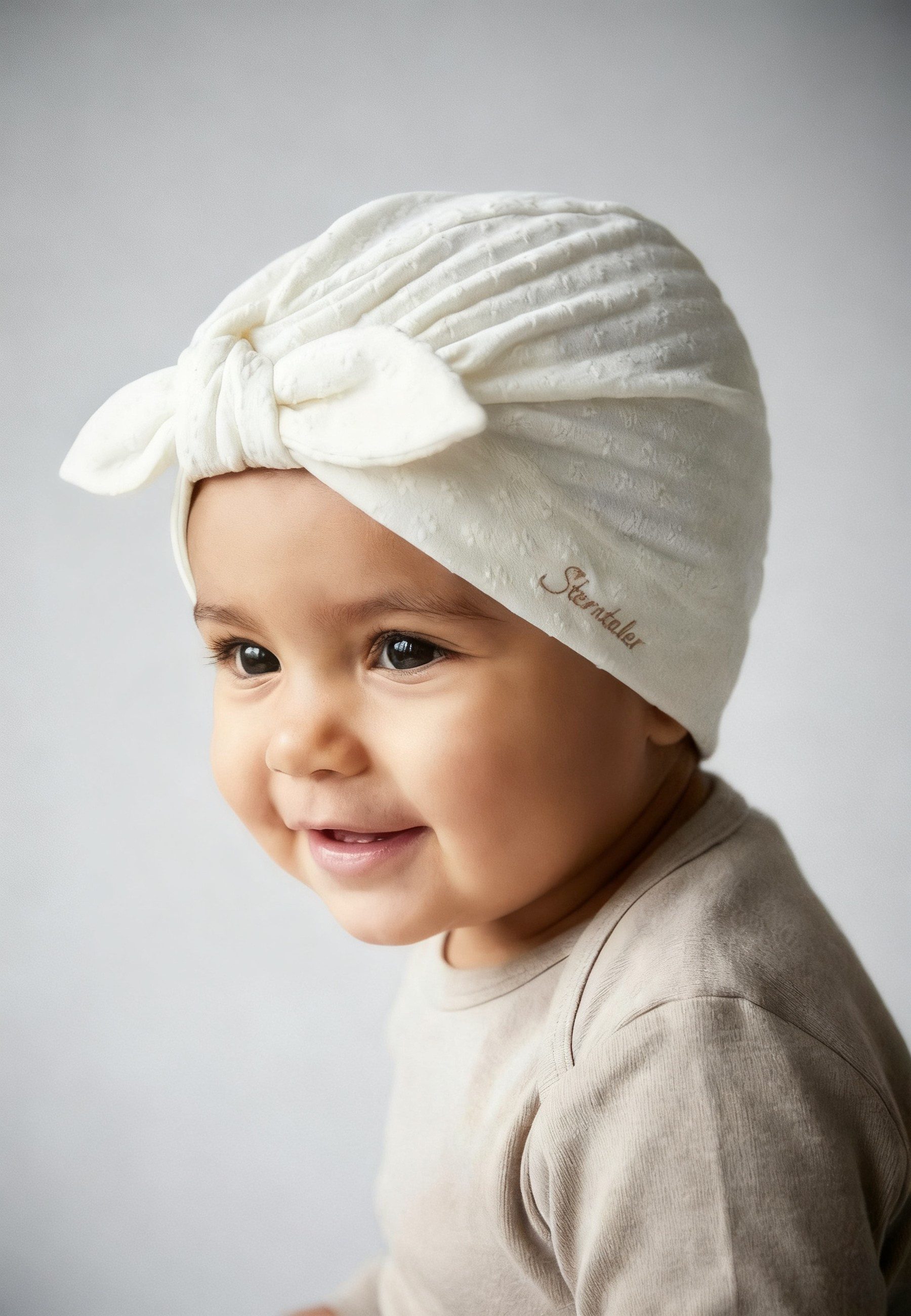 Sterntaler® Beanie UV-Schutz 50+ Knotenmütze Struktur (1-St) Knotenmütze aus strukturiertem Mischgewebe