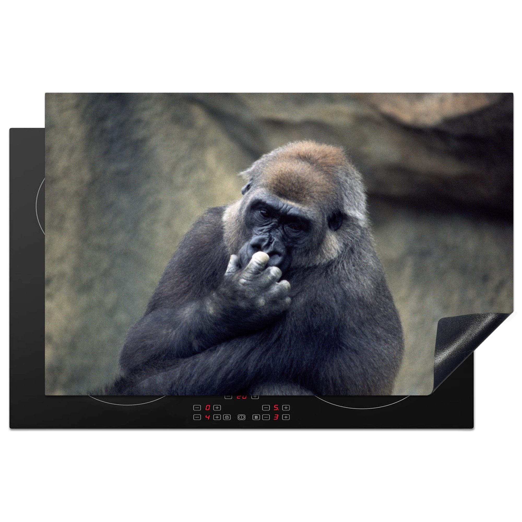 MuchoWow Herdblende-/Abdeckplatte Niedlicher Gorilla kratzt sich an der Nase, Vinyl, (1 tlg), 81x52 cm, Induktionskochfeld Schutz für die küche, Ceranfeldabdeckung