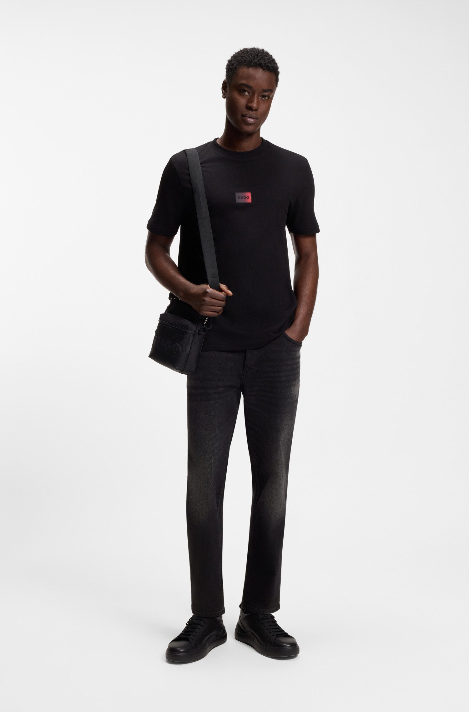HUGO Tapered-fit-Jeans HUGO 634 aus Stretch-Denim, mit Knopfleiste – Bild 3 von 5