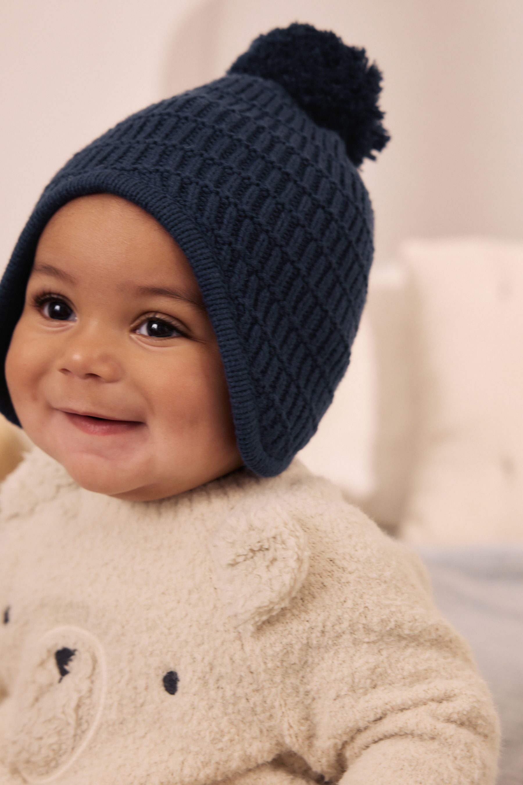 Next Strickmütze Gestrickte Baby Trappermütze (1-St)