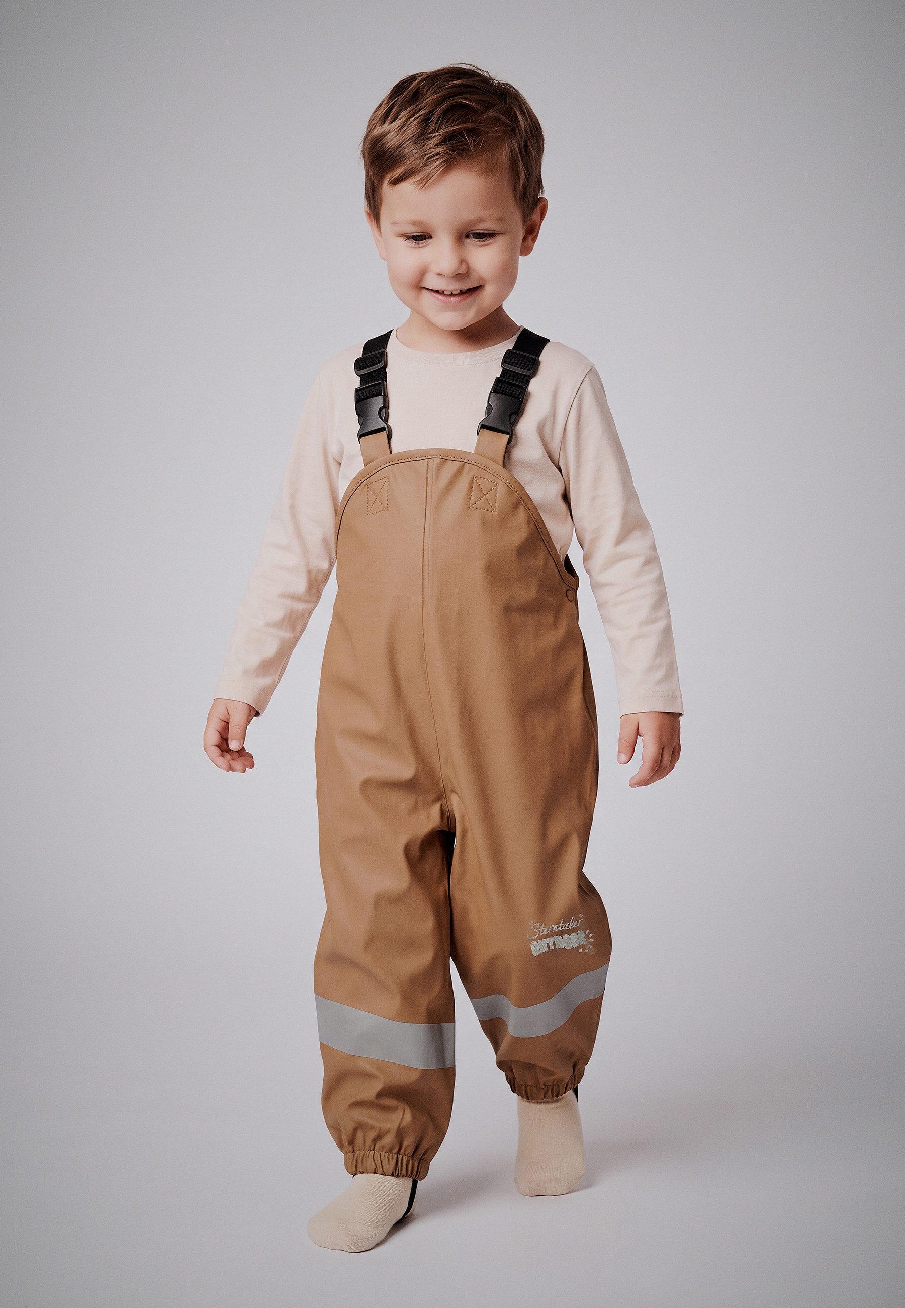 Sterntaler® Regenhose Matschhose ungefüttert uni (1-tlg., Regenträgerhose mit Druckknöpfen, Regenhose mit süßen Motiven) Kinder Hosenträger mit Reflektoren, Matschhosenträger verstellbar