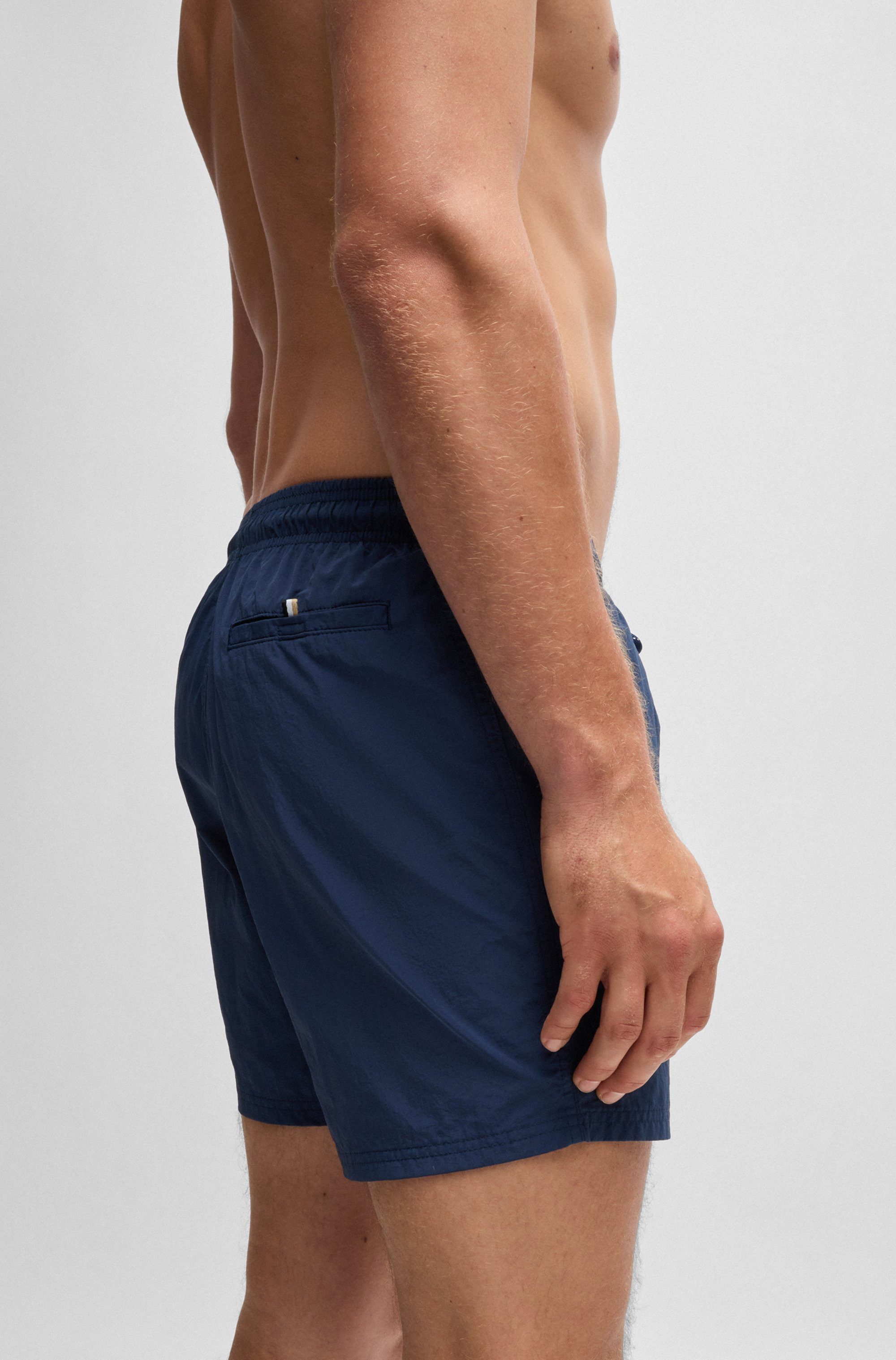 BOSS Badeshorts Octopus Mit BOSS Logoschriftzug, elastischer Taillenbund mit Kordel