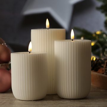 Deluxe Homeart LED-Kerze Mia gerillt Echtwachs flackernd H: 15cm D: 8cm weiß mit Rillen