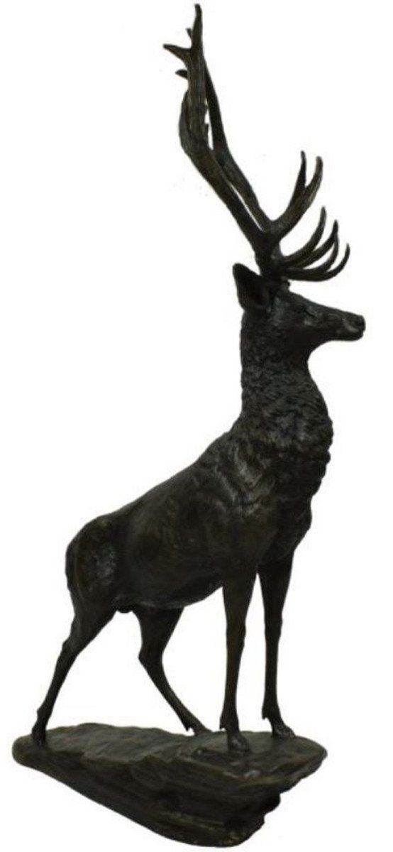 Casa Padrino Dekofigur Luxus Bronze Skulptur Hirsch auf Felsen Bronze / Schwarz 80 x 60 x H. 160 cm - Bronzefigur - Tierfigur - Hotel & Restaurant Deko Accessoires