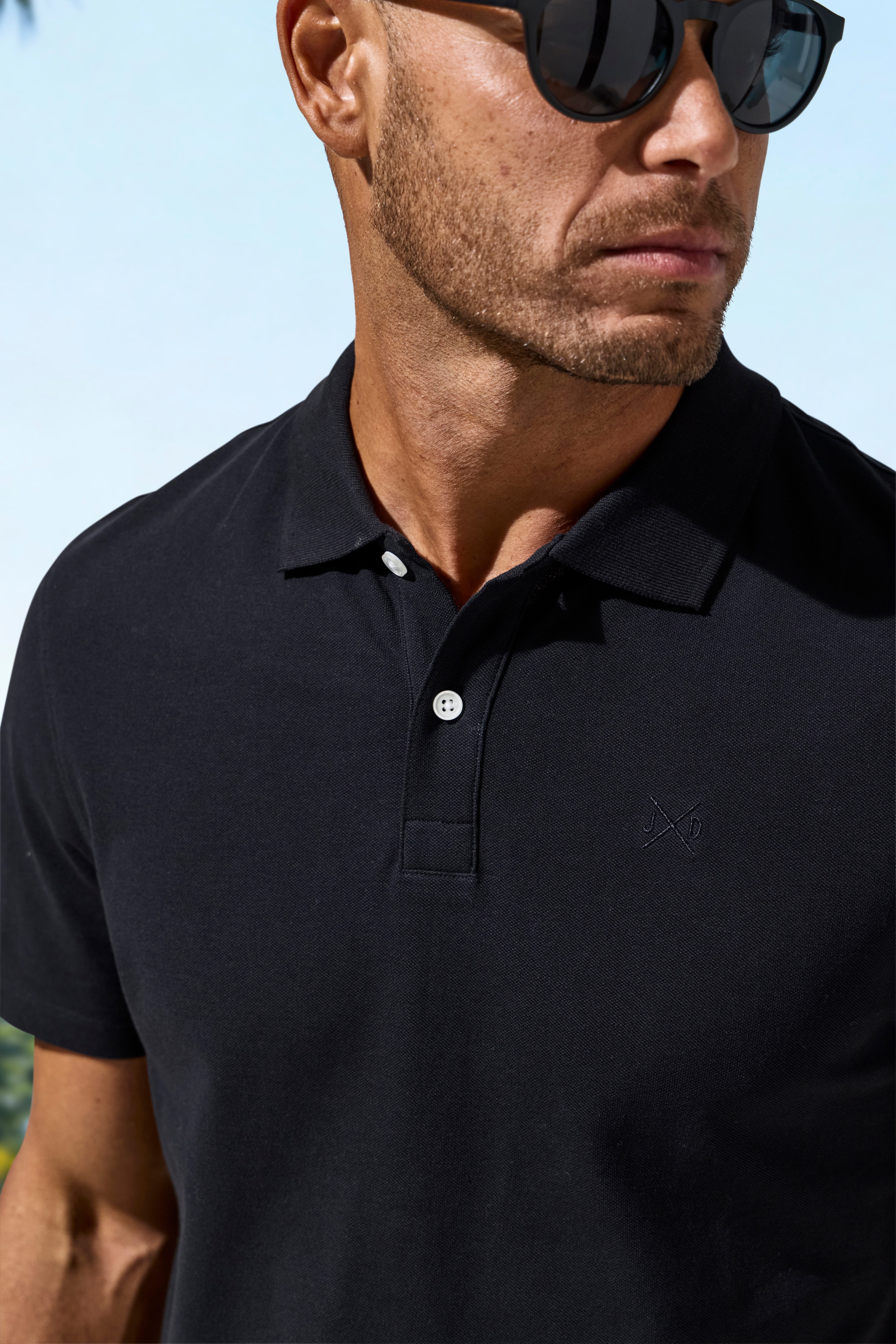 John Devin Poloshirt mit dezenter, hochwertiger Logostickerei