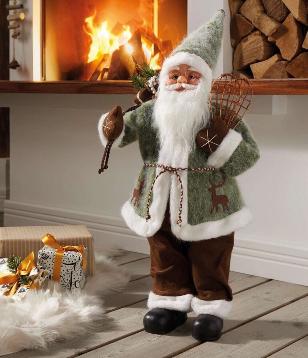 Home-trends24.de Weihnachtsfigur Weihnachtsmann Santa Schneeschuhe Fell Weihnachten Grün 60 cm