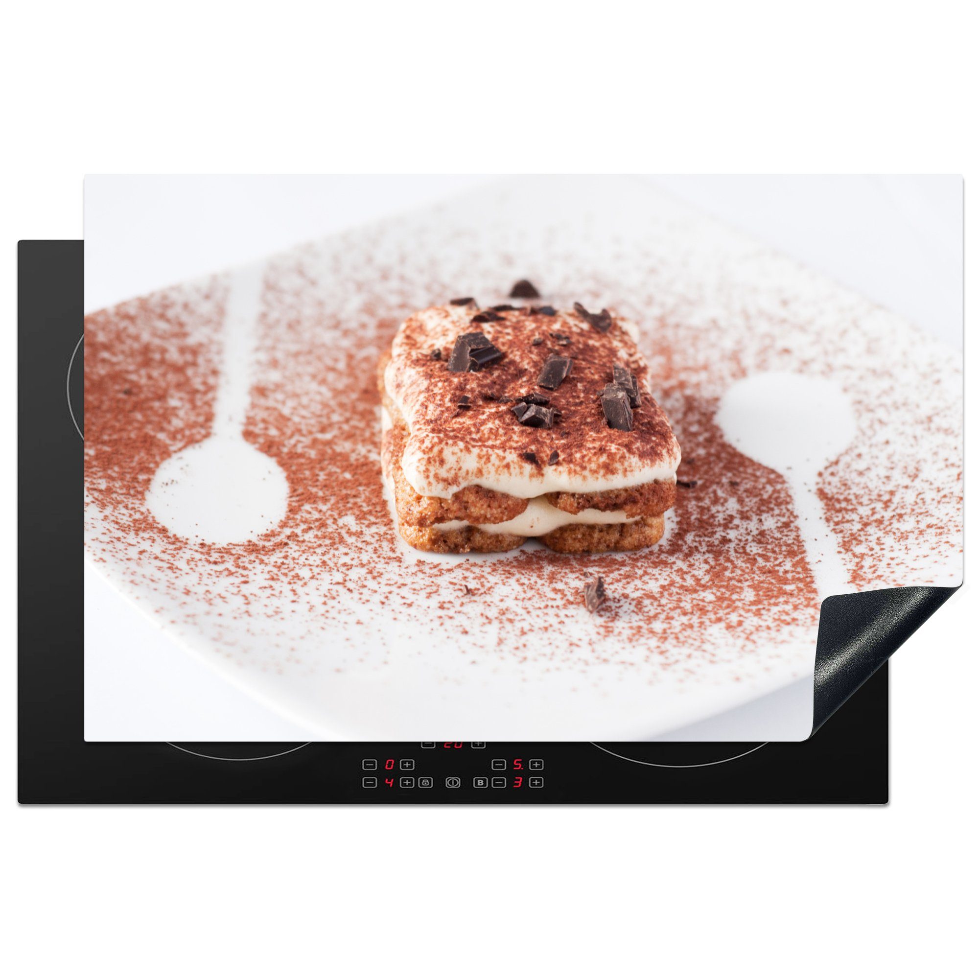 MuchoWow Herdblende-/Abdeckplatte Eine Seitenansicht einer Tiramisu-Torte, Vinyl, (1 tlg), 81x52 cm, Induktionskochfeld Schutz für die küche, Ceranfeldabdeckung