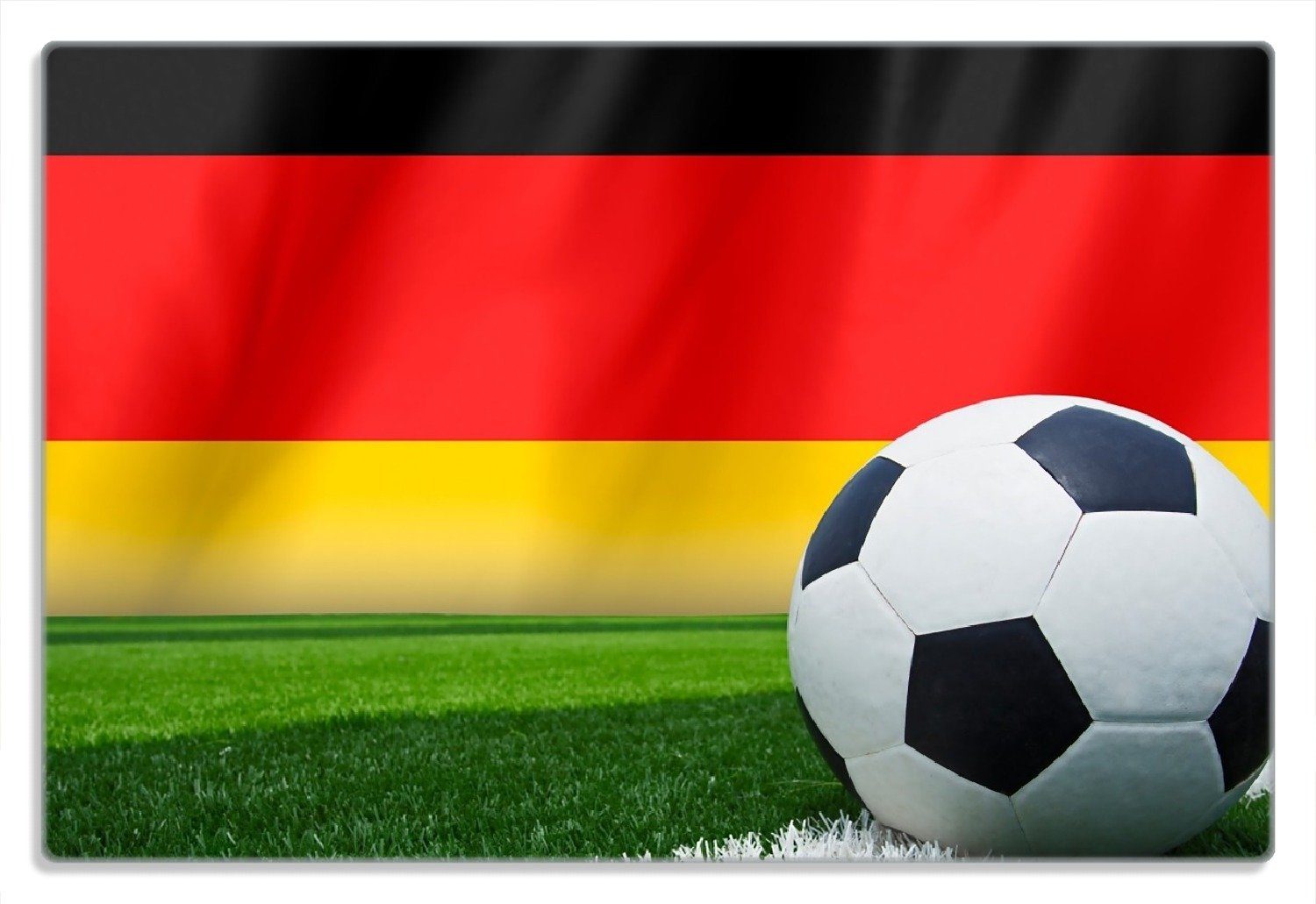 Wallario Frühstücksbrett Fußball vor einer Deutschlandflagge, (inkl. rutschfester Gummifüße 4mm, 1-St), 20x30cm