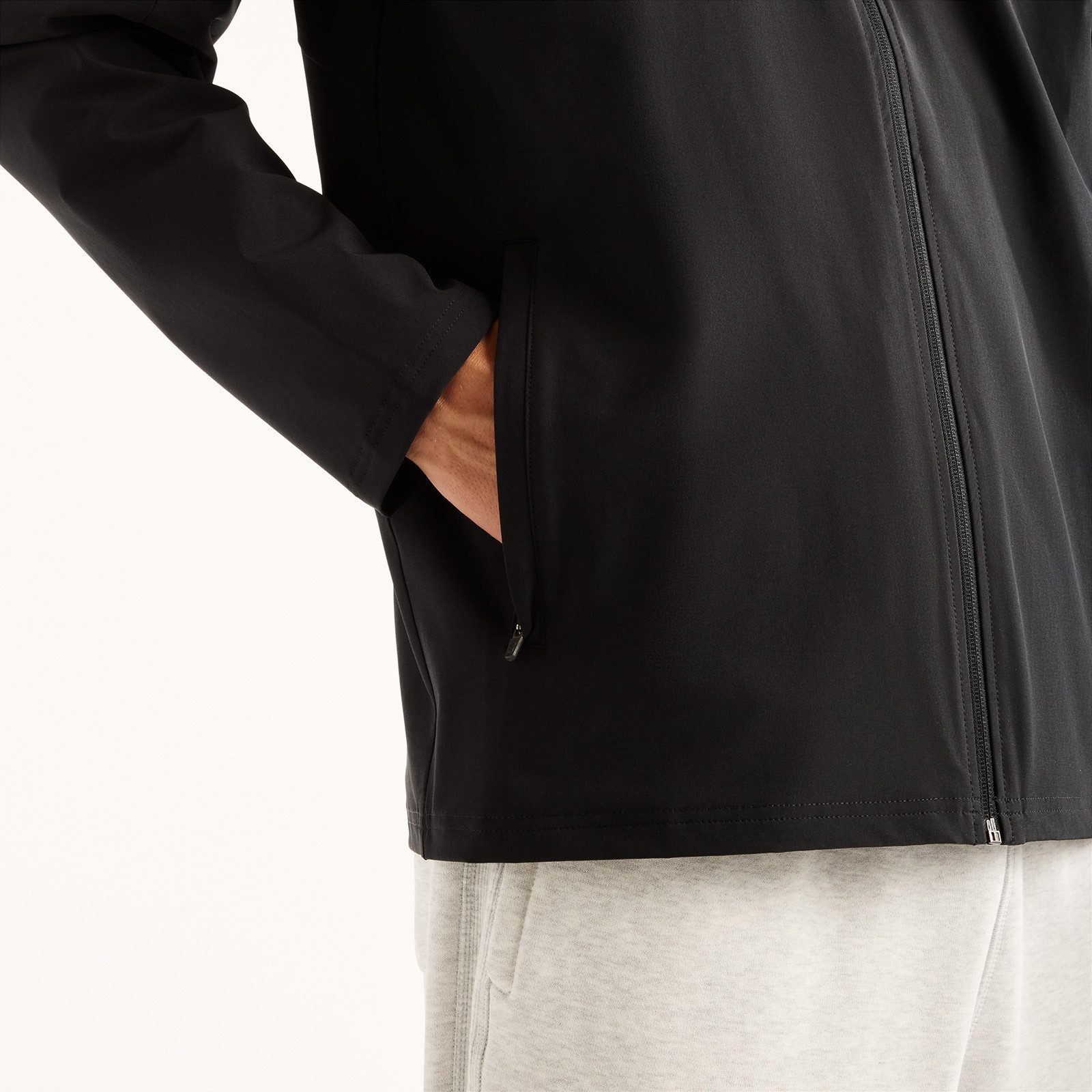 New Balance Trainingsjacke UTILITY STRETCH WOVEN JACKET Trainingsjacke für Fitness und sportliche Aktivitäten