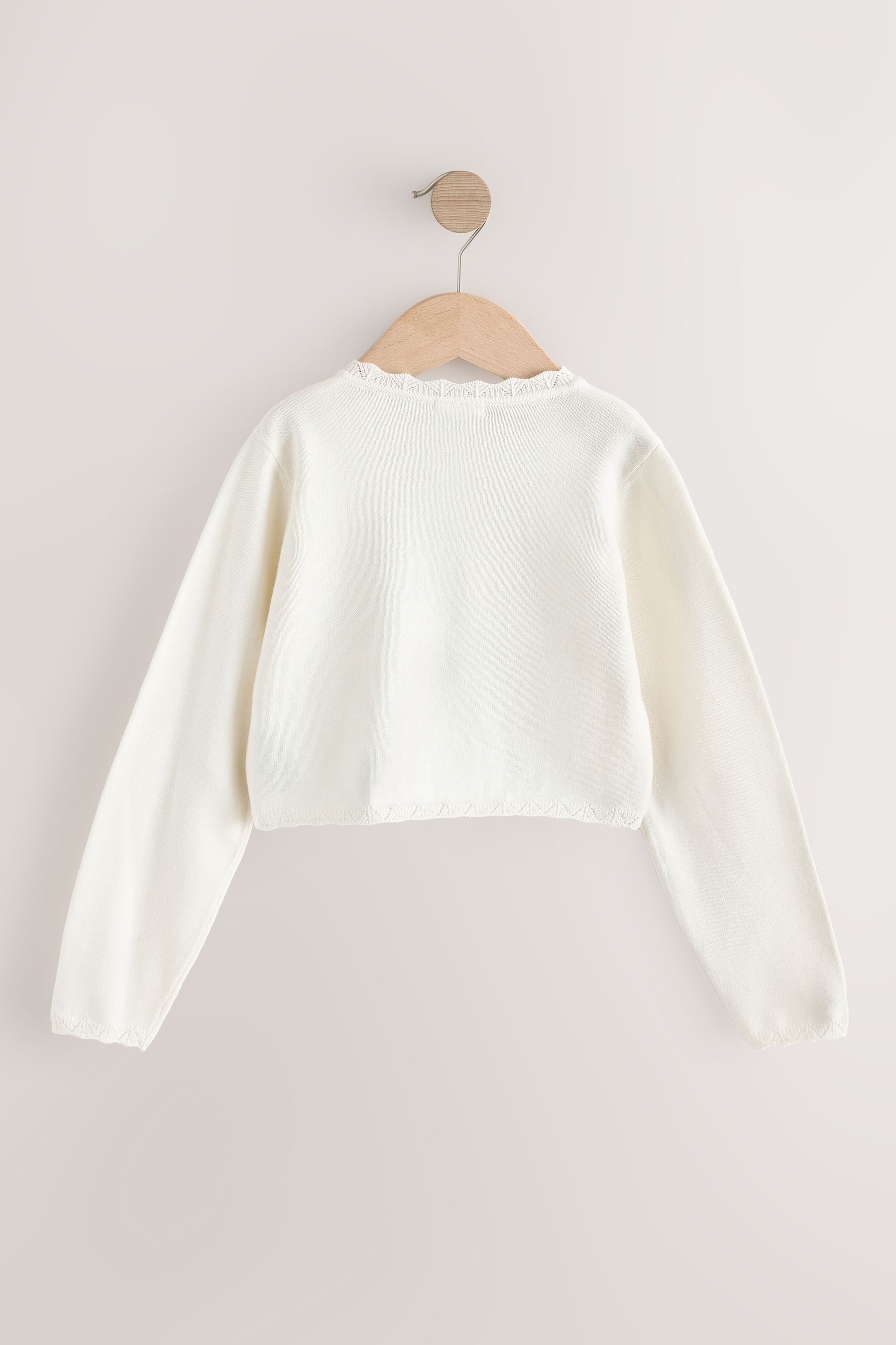 Next Strickjacke Eleganter Shrug mit Zierdetails 100 % Baumwolle (1-tlg)