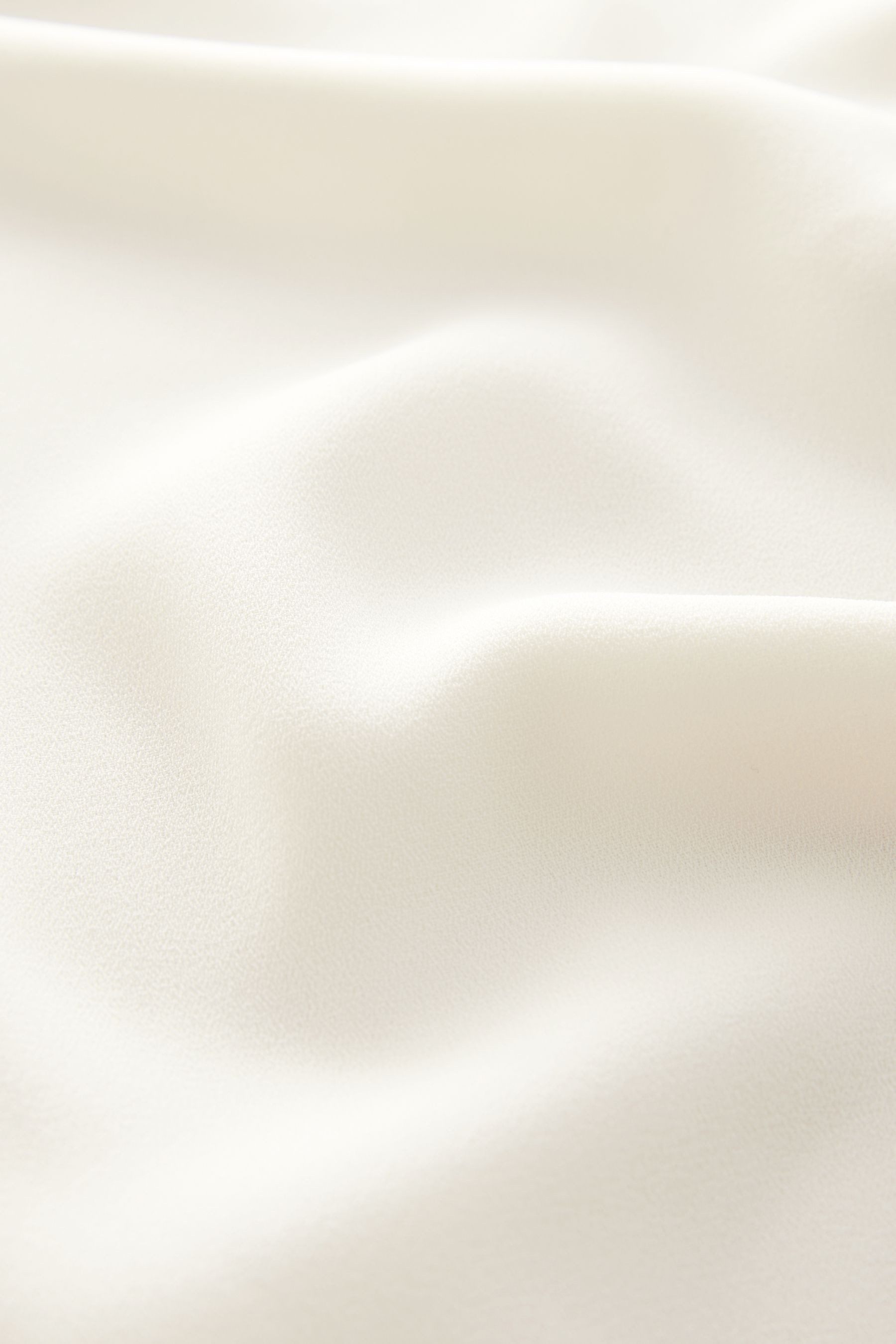 Next Kurzarmbluse Relaxed Fit Schlupfbluse mit V-Ausschnitt (1-tlg)