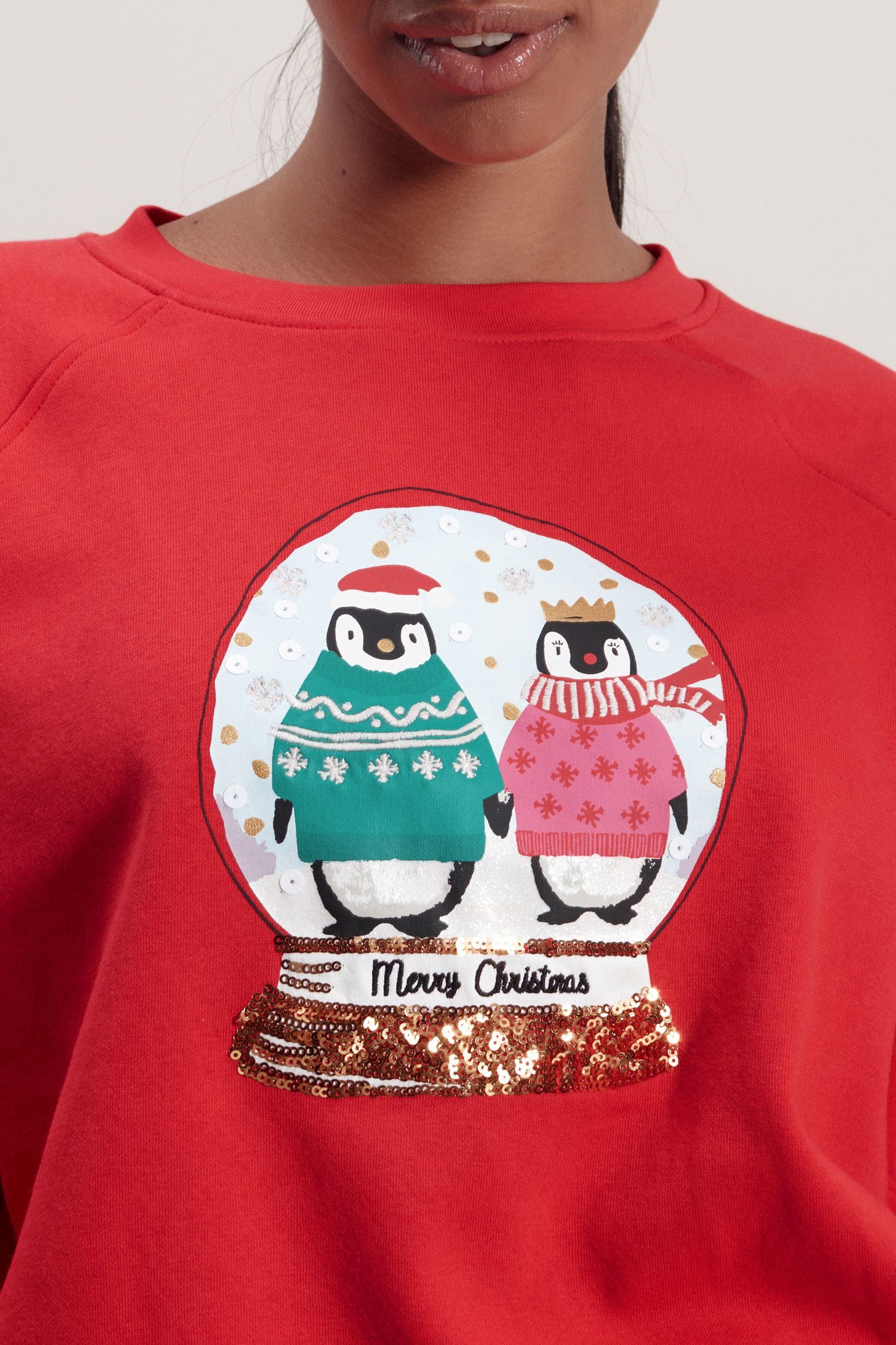 Pinguin Weihnachtspullover Schneekugel Pailletten Sweatshirt (1-tlg) Next