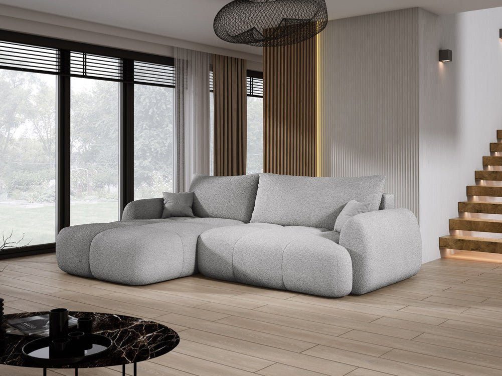 Luxusbetten24 Schlafsofa Designer L Sofa Coco in Bouclé, mit integrierter Liegefunktion