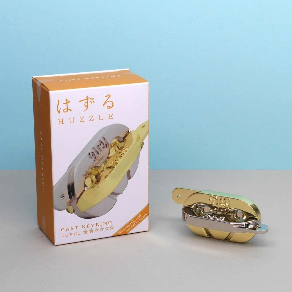 Hanayama Spiel HUZZLE CAST KEYRING - unterhaltsames Denkspiel, Knobelspiel, Metallpuzzle