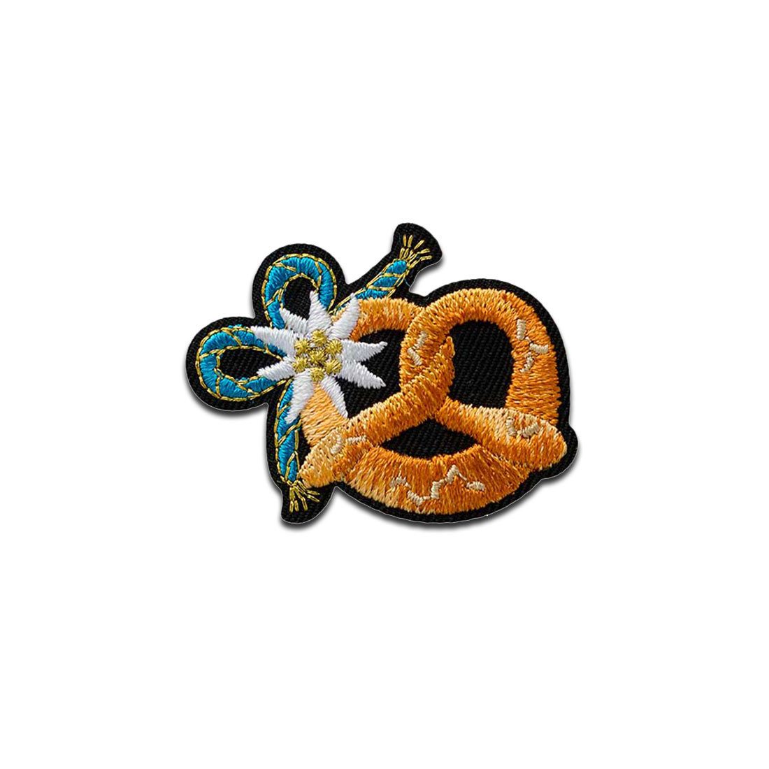 Mono-Quick Aufnäher Bügelbild, Aufbügler, Applikationen, Patches, Flicken, zum aufbügeln, Polyester, Brezel mit Edelweiß - Größe: 3,3 x 4,3 cm