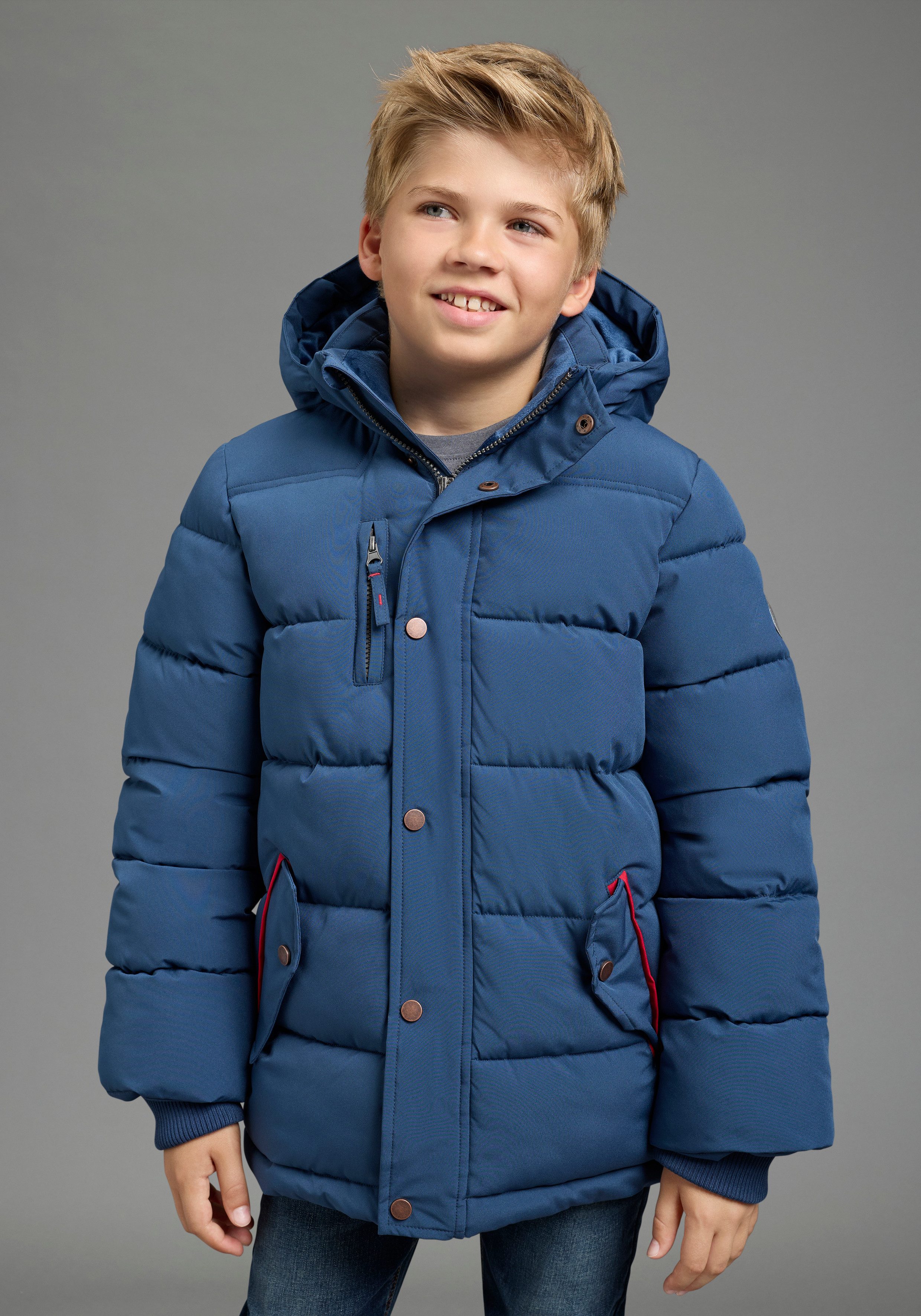 KIDSWORLD Outdoorjacke Winterwarme Jacke, gesteppt Trendige Winterjacke mit refklektierenden Details