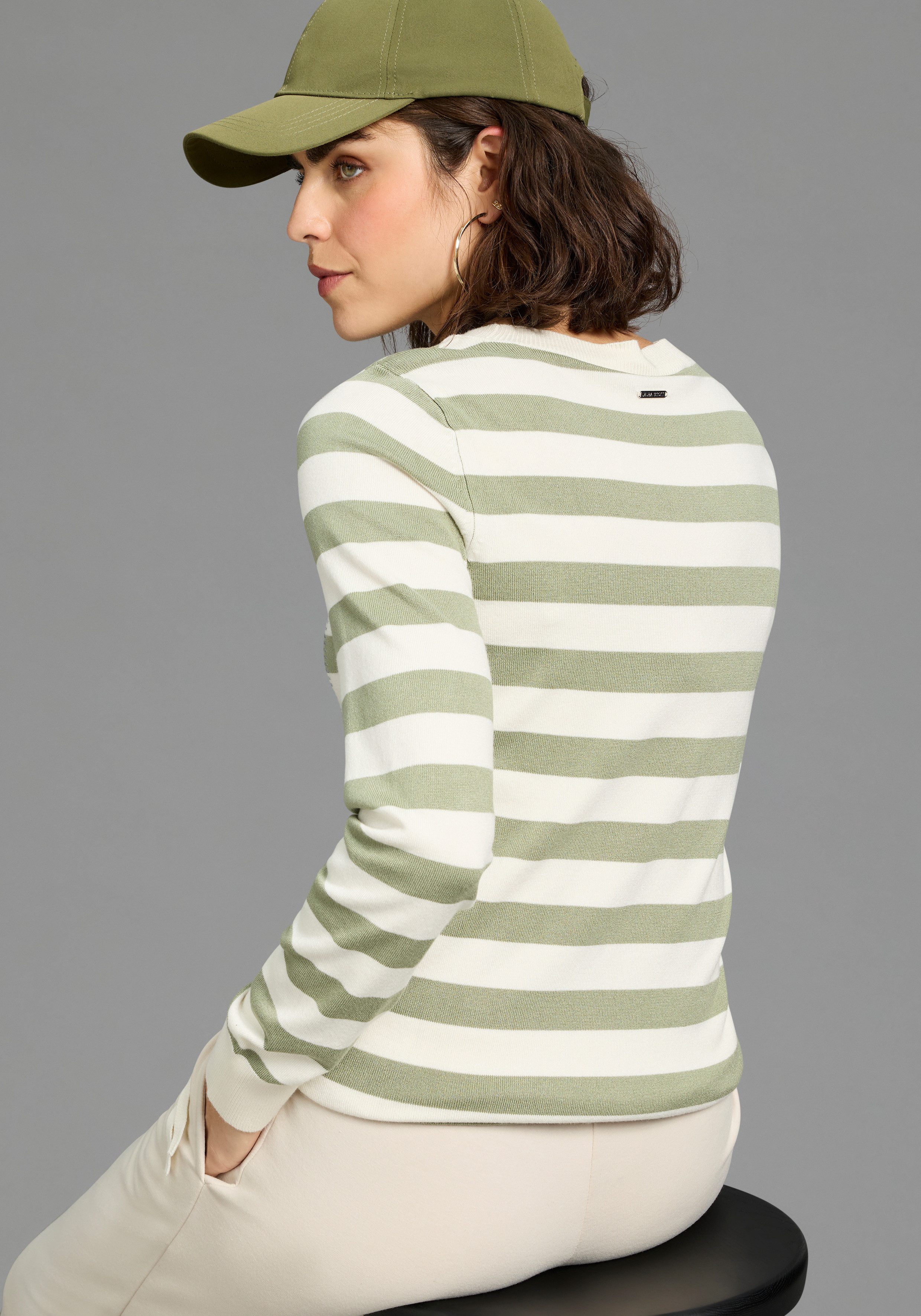 Laura Scott Streifenpullover leichter Übergangspullover mit Glitzerschrift und Bindeband. € 49,99, (€ 49,99 pro 1 Stk).