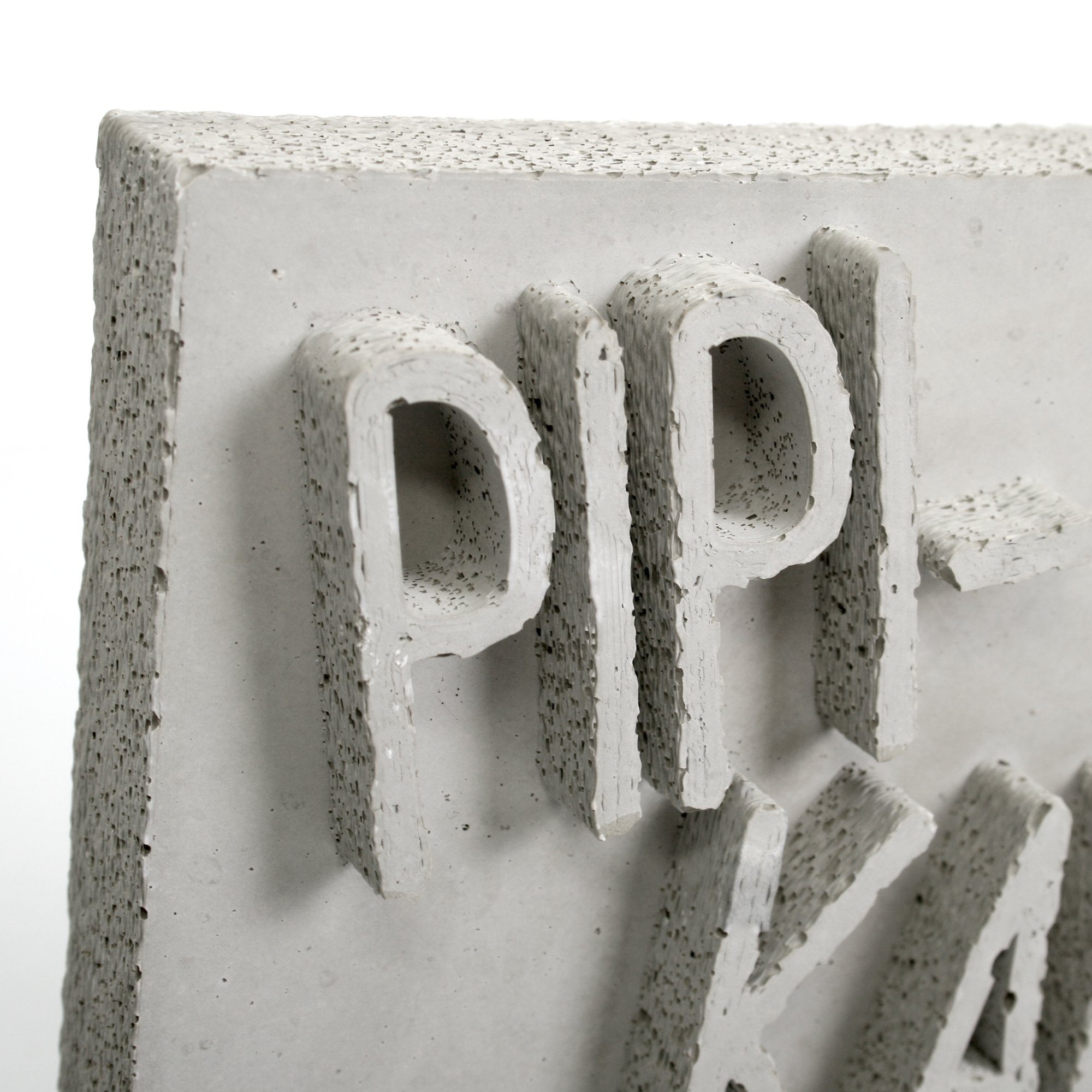 Kreative ein AUFSTELLER Beton, „PIPI-KAKA-LAND“ jedes Grau Dekorativer handgegossen Deko-Schriftzug aus Feder Einzelstück Unikat