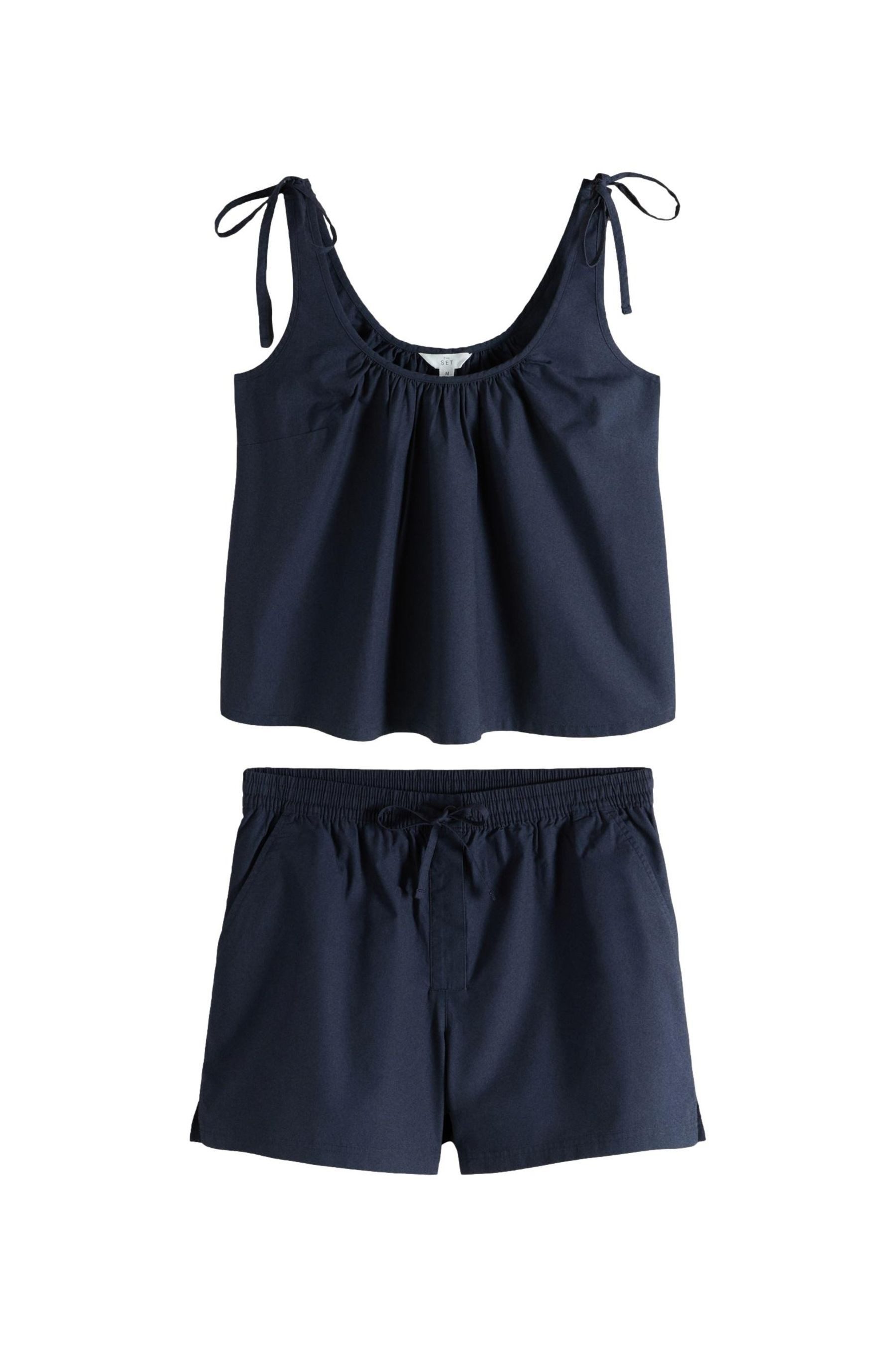 The Set Freizeitanzug The Set Top mit gebundener Schulter und Shorts (2-tlg)