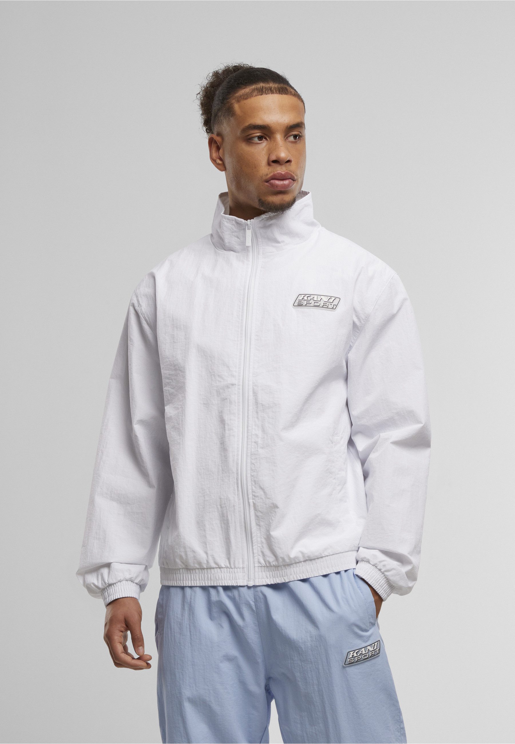 Karl Kani Trainingsjacke Karl Kani Sport Patch Essential Trackjacket white (1-St)