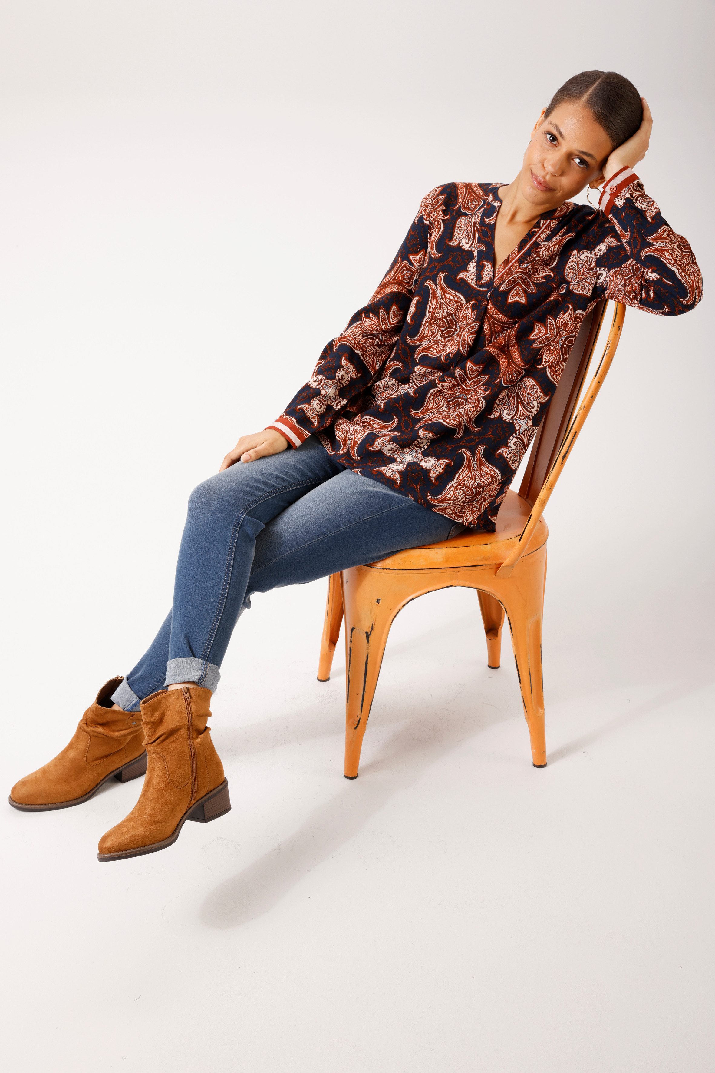 Zum Outfit 9