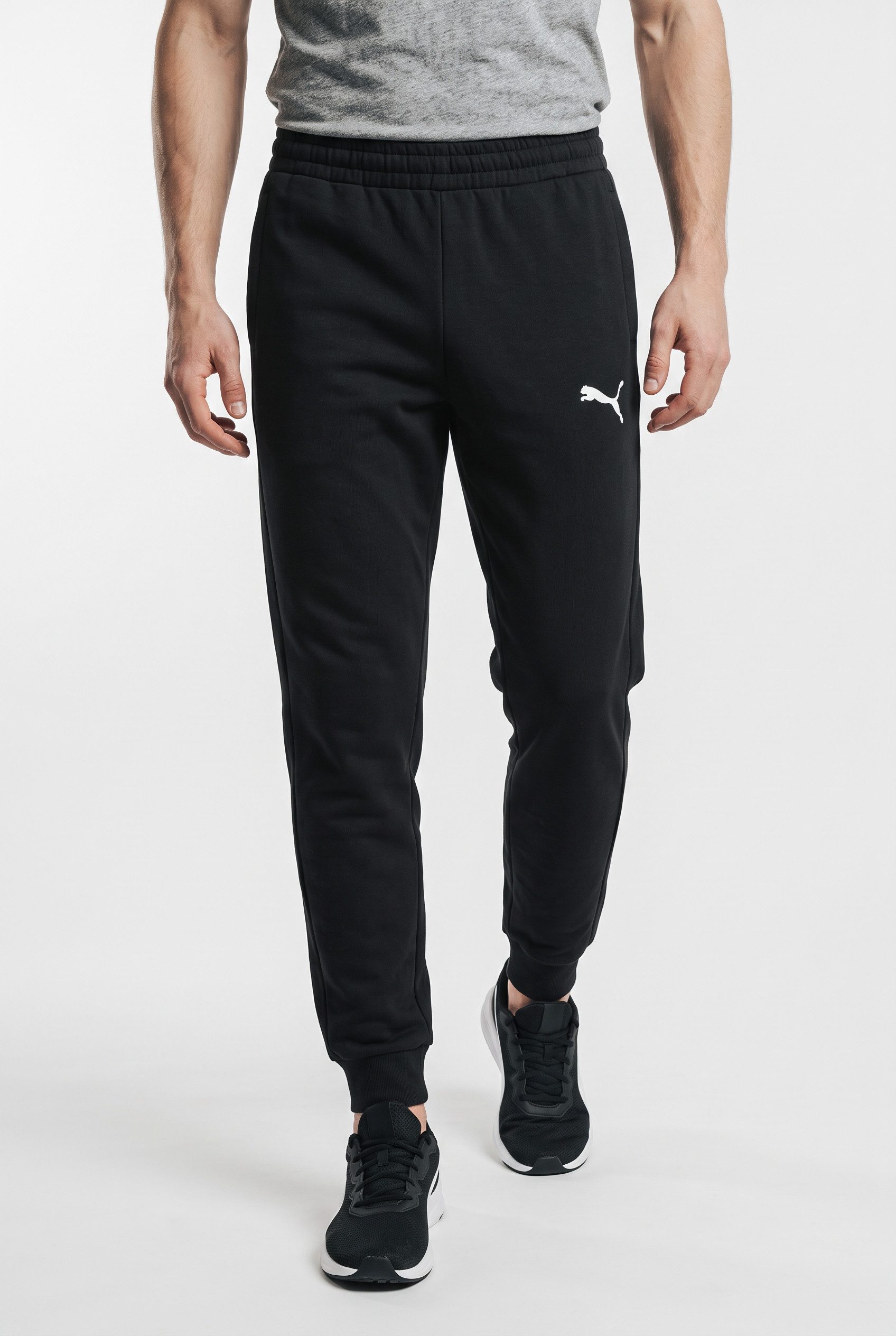 PUMA Trainingshose TEAMGOAL CASUALS PANTS Slim Fit Passform, für Fußball und sportliche Aktivitäten