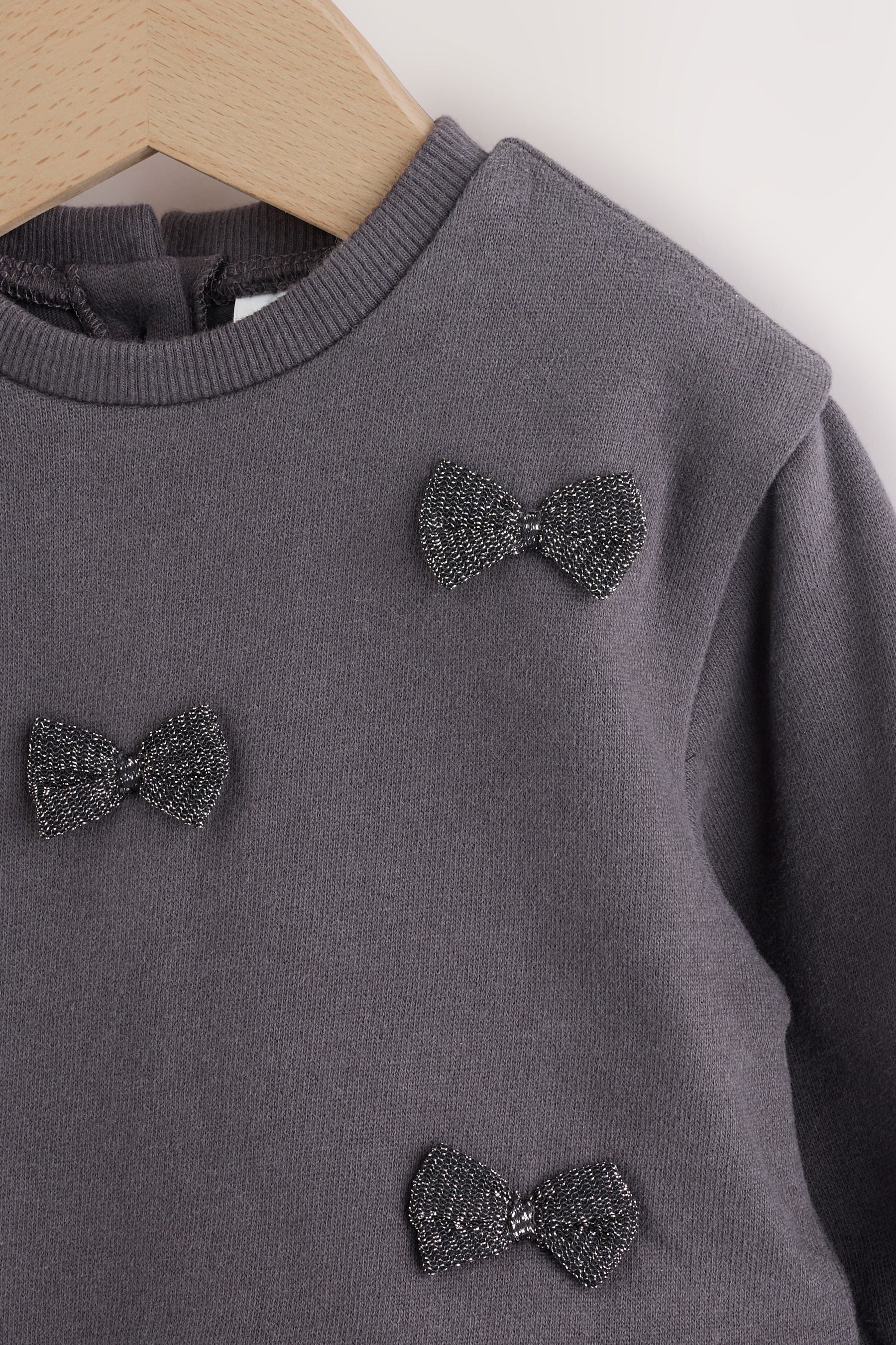 Next Strickkleid Glitzerndes Baby Meshkleid (1-tlg)