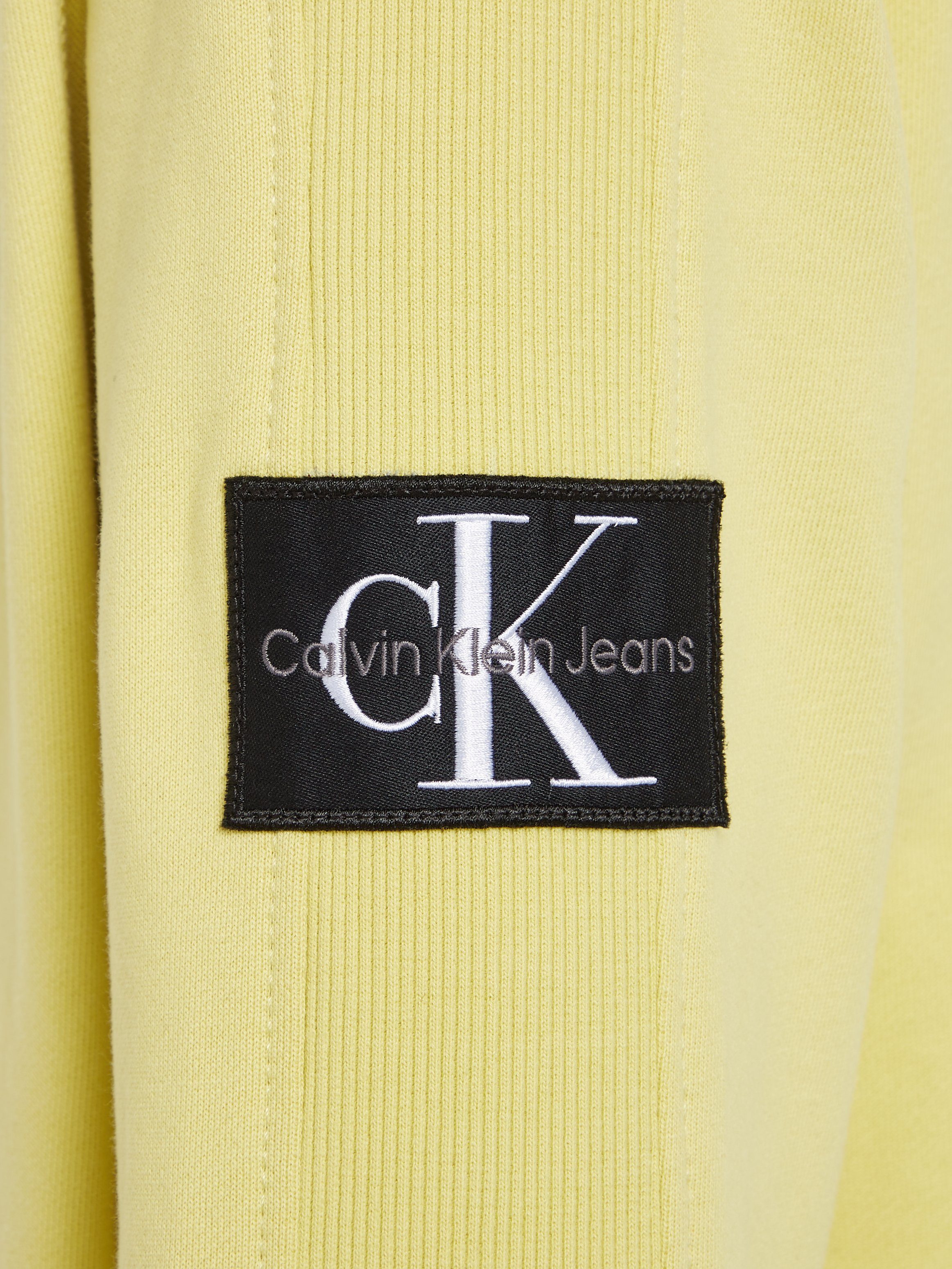 HOODIE Kapuzensweatshirt Jeans mit Yellow BADGE Logopatch Klein Sand Calvin