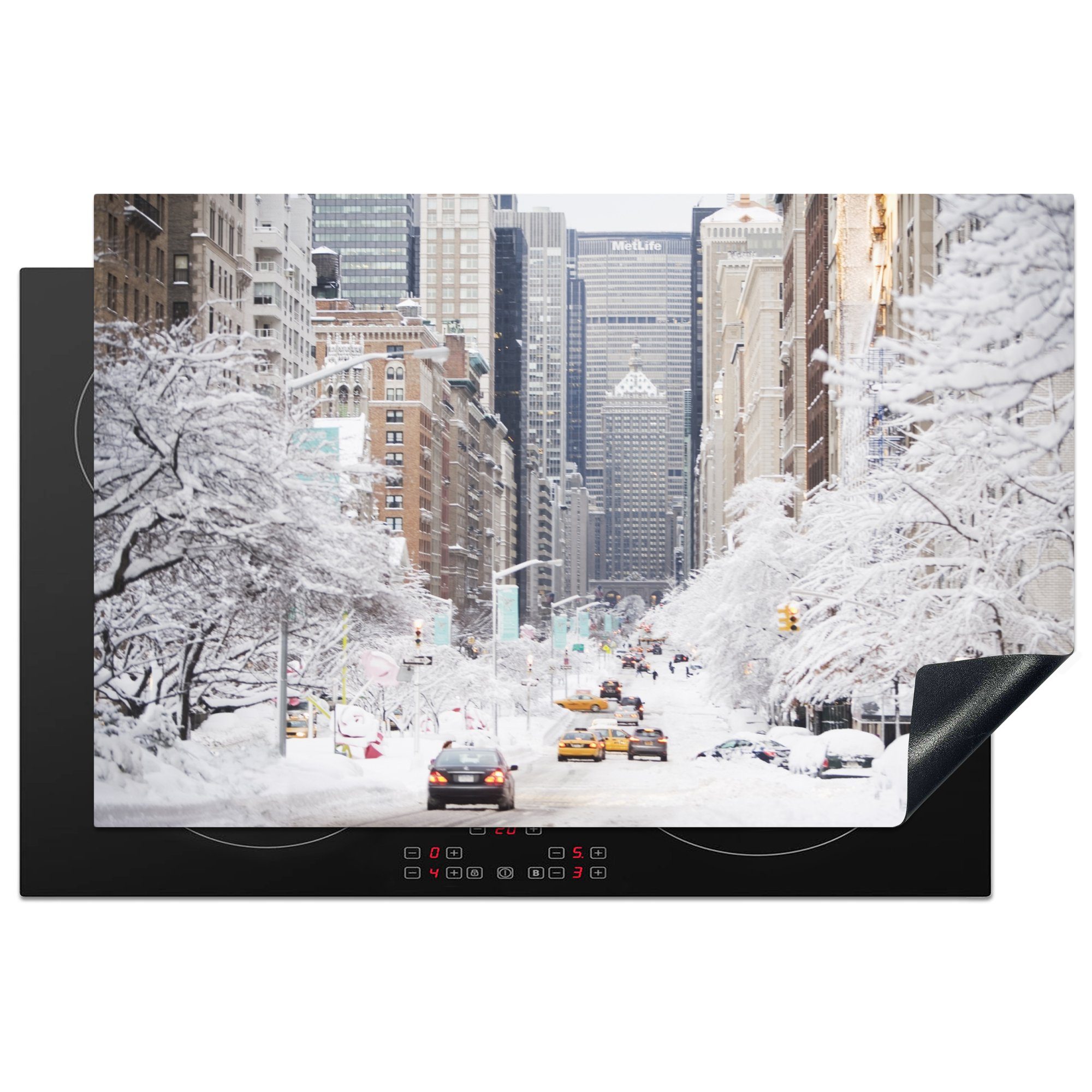 MuchoWow Herdblende-/Abdeckplatte Park Avenue in New York im Winter, Vinyl, (1 tlg), 81x52 cm, Induktionskochfeld Schutz für die küche, Ceranfeldabdeckung