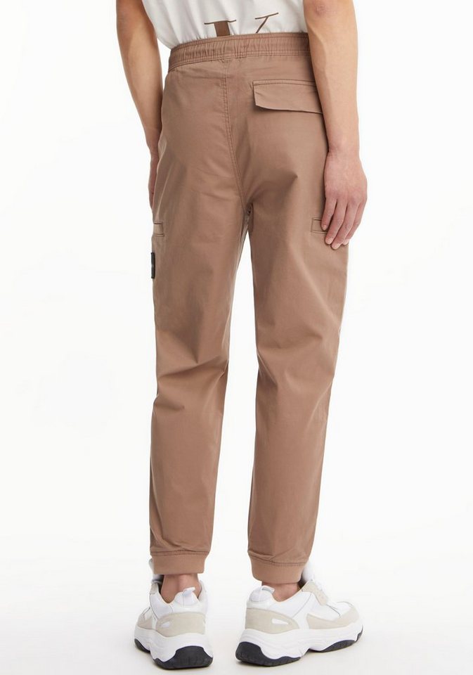 Calvin Klein Jeans Jogginghose BADGE ELASTIC TRIM WOVEN PANT mit Calvin  Klein Logo-Badge auf dem Bein