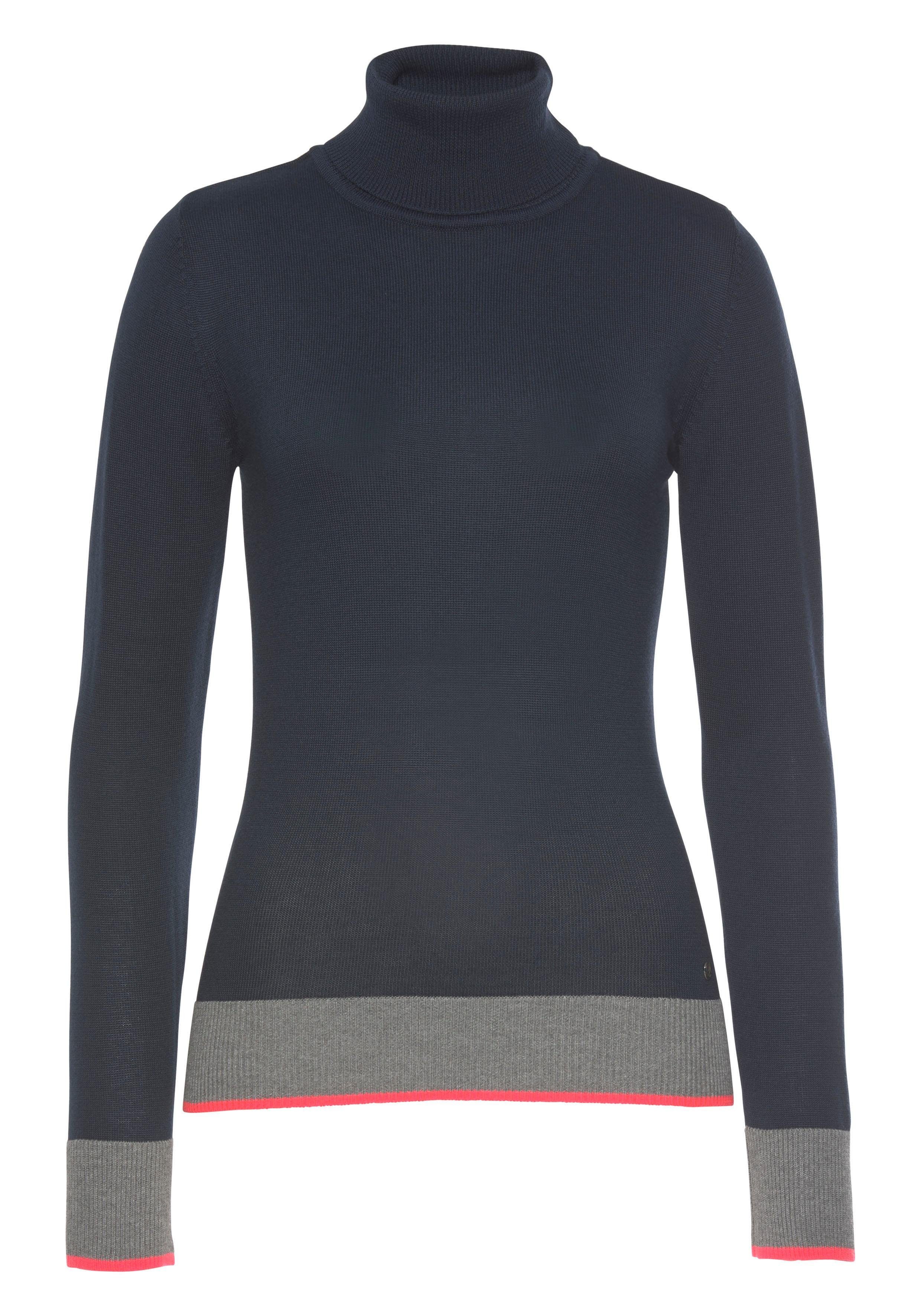 AJC Rollkragenpullover in enger Form mit Farbkontrasten. Reduzierter Preis € 23,09. Unverbindliche Preisempfehlung € 32,99, (€ 23,09 pro 1 Stk)