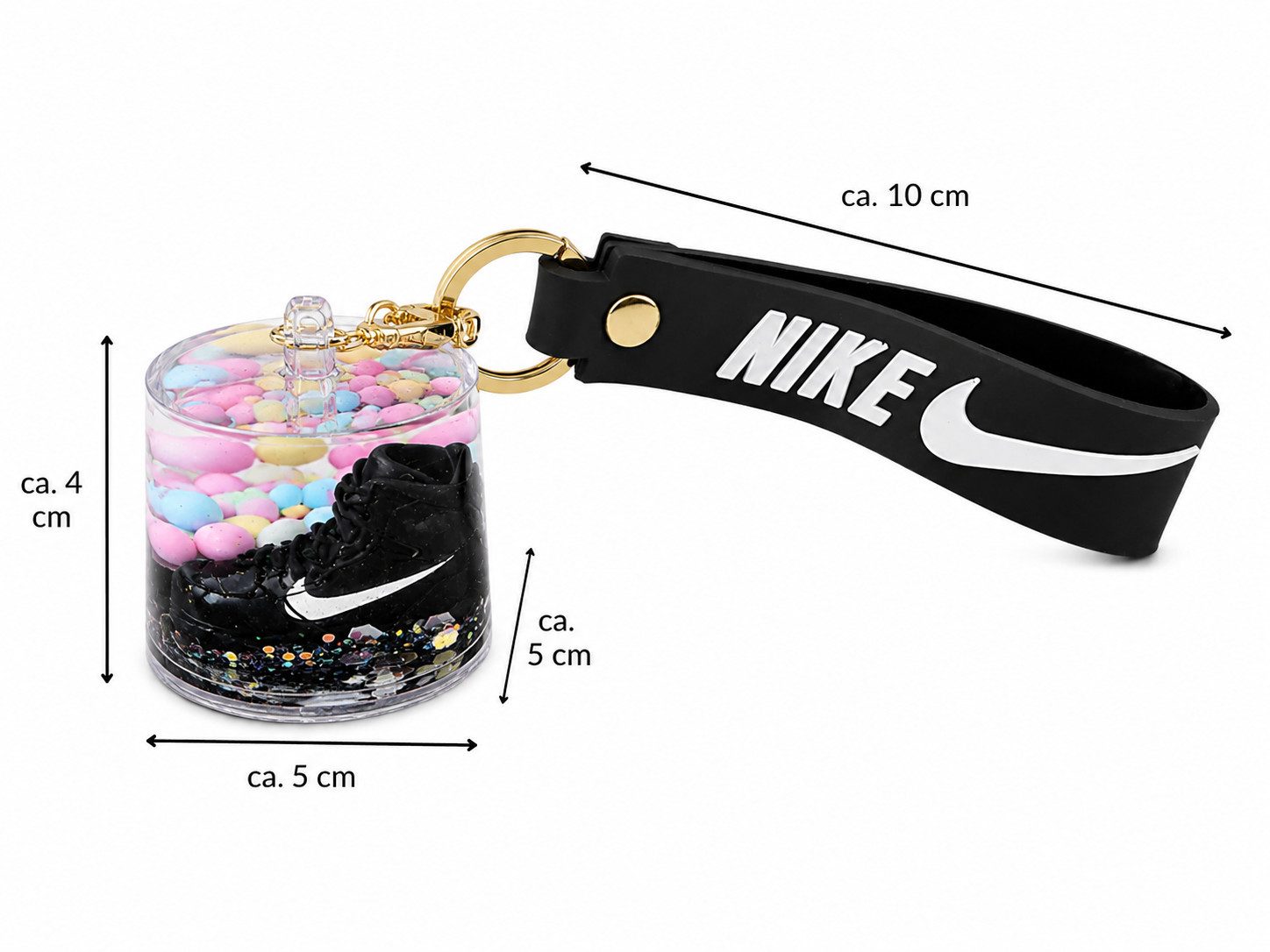 soma Schlüsselanhänger Rucksackanhänger mit Mini-Schneekugel und Sneaker, Silikonband (Set, 1-tlg., Geschenk-Set), Glitzer-Effekt im geschlossenen Gehäuse mit dekorativem Sneaker