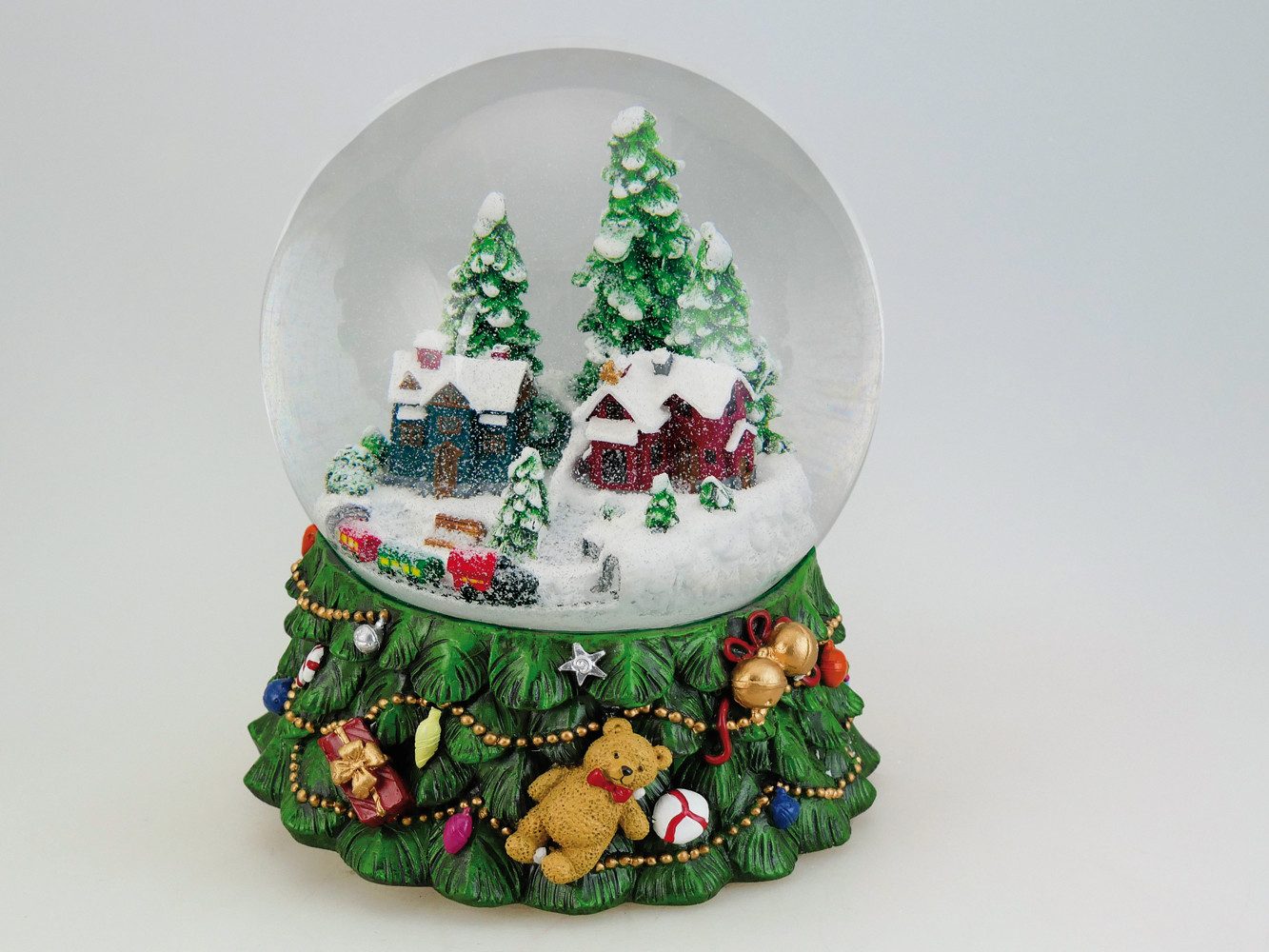 Musicboxworld Spieluhr Spieluhr - Schneekugel Beleuchtetes Winterdorf mit Zug