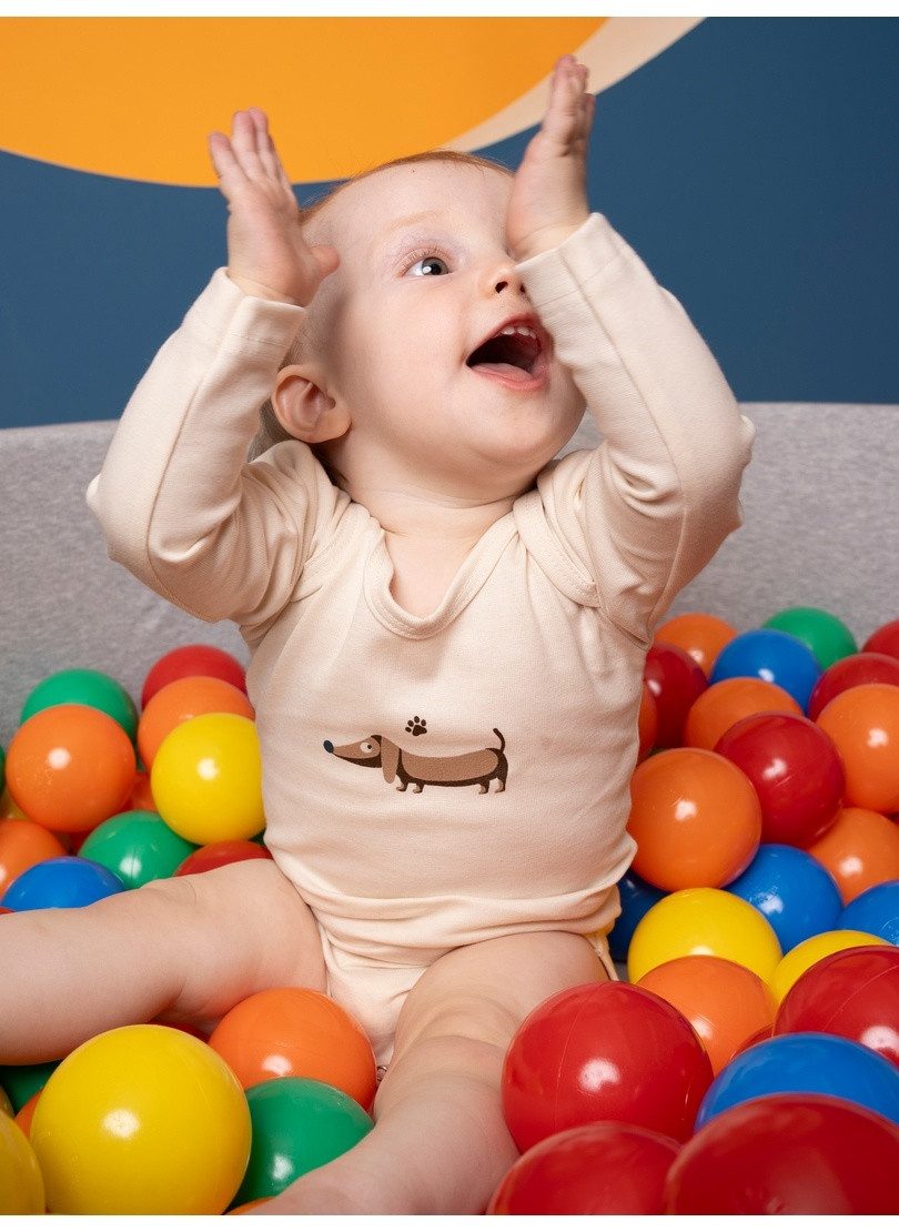 Trigema Rollkragenshirt TRIGEMA Baby Body mit Dackelmotiv (1-tlg)