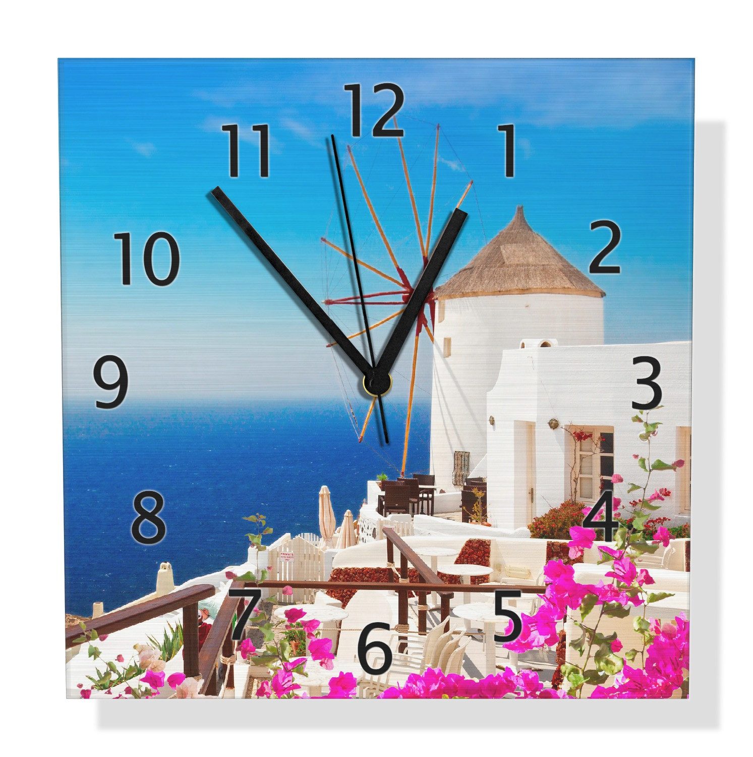 Wallario Wanduhr Windmühle über azurblauem Meer (Aluverbunduhr)